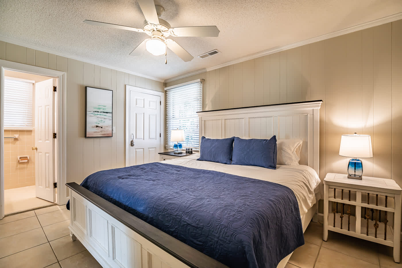 Ground Floor Apartment Primary Bedroom with King Bed and Full En Suite Bathroom