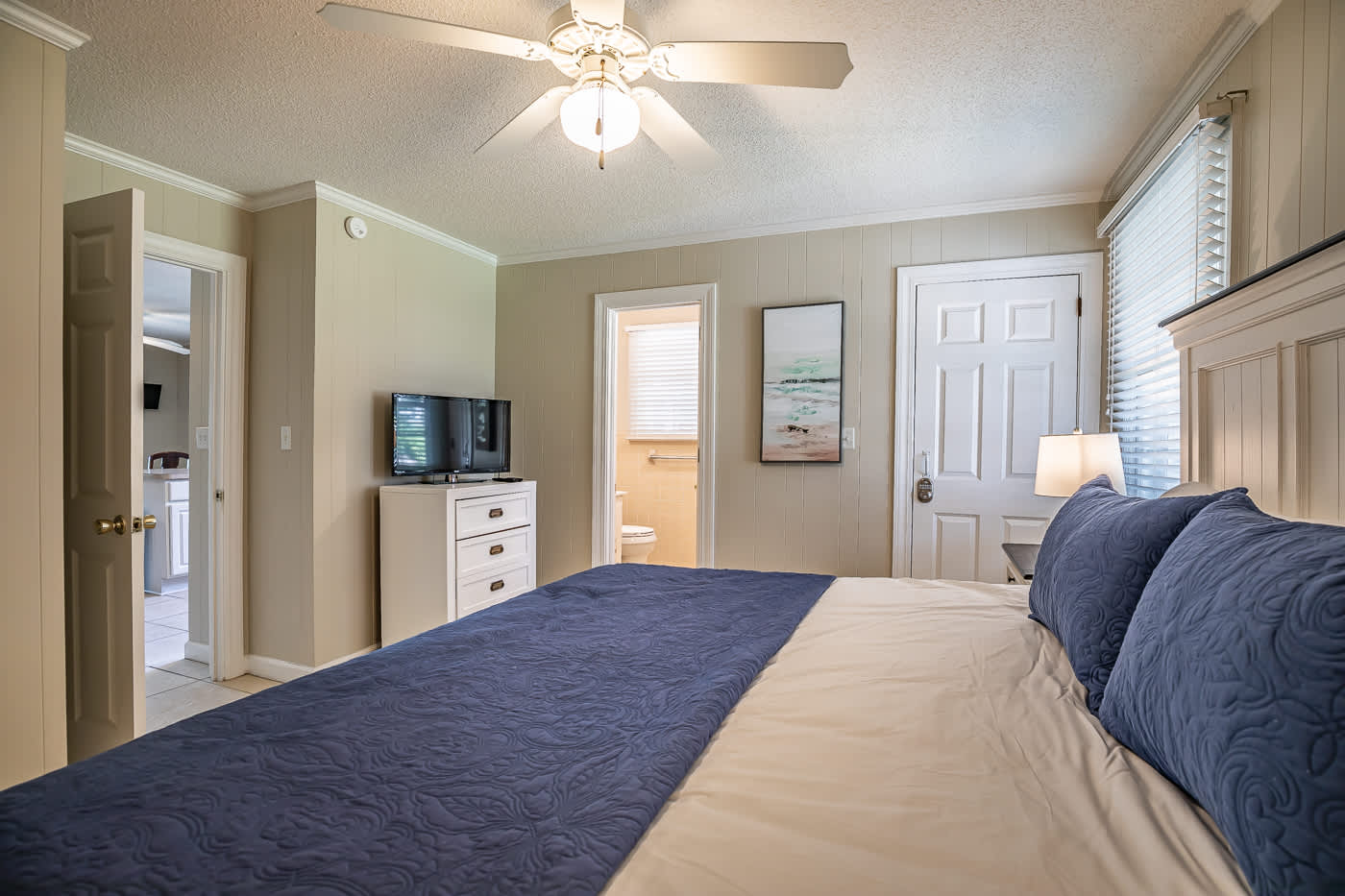 Ground Floor Apartment Primary Bedroom with King Bed and Full En Suite Bathroom