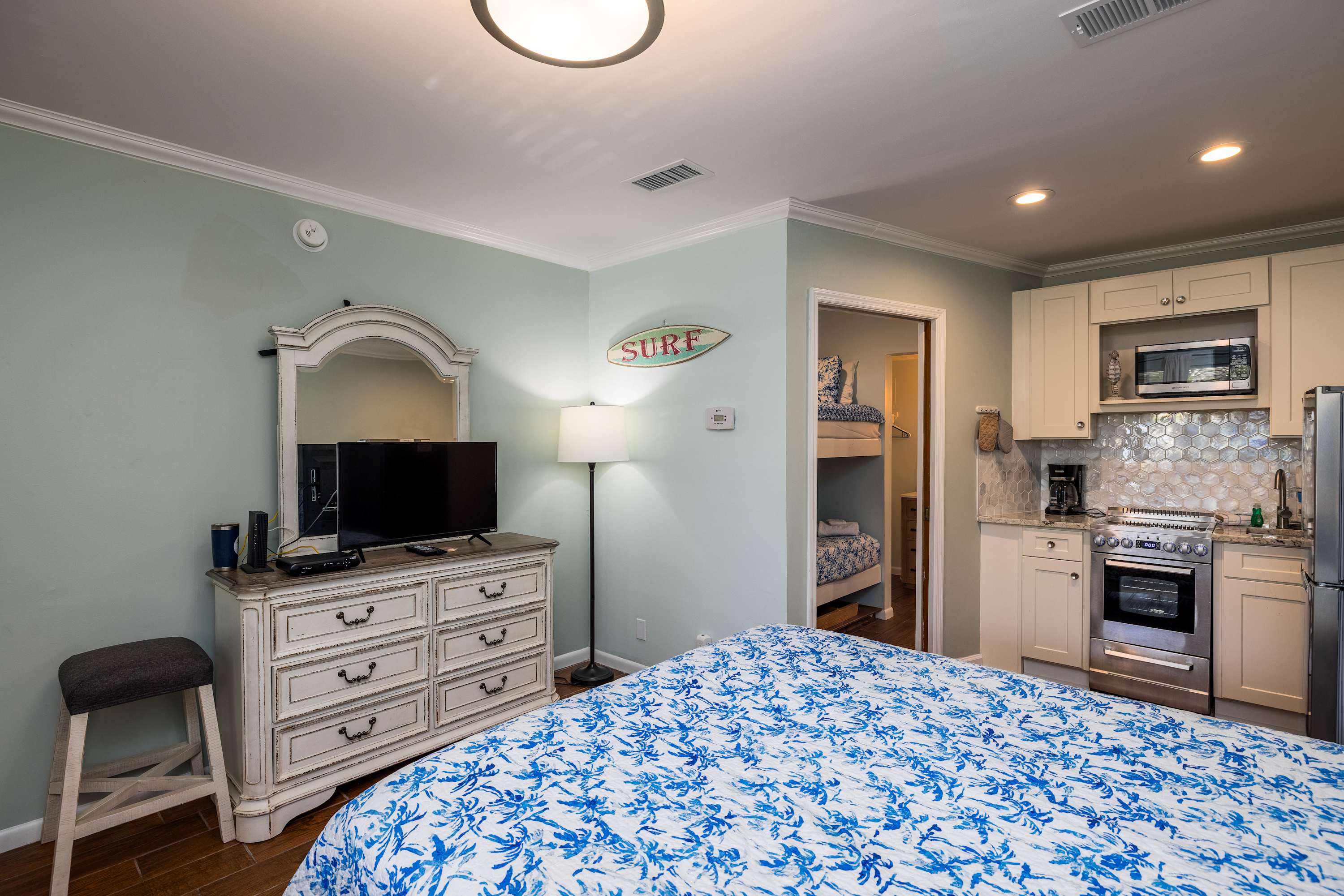 Queen Bed with Kitchen and Eating Area 