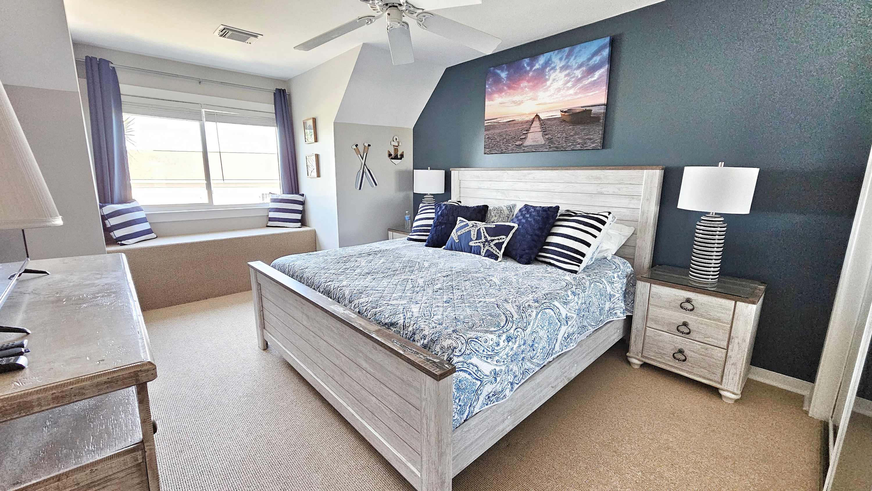 First floor primary bedroom with en suite bathroom