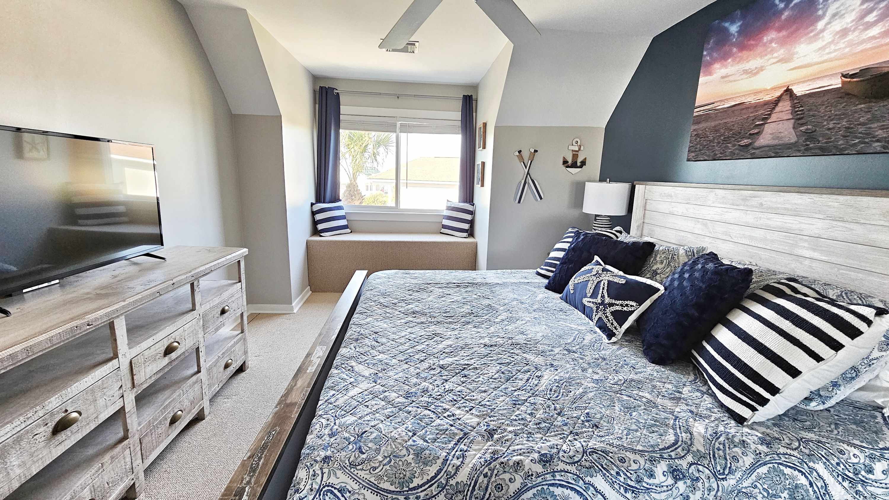 First floor primary bedroom with en suite bathroom