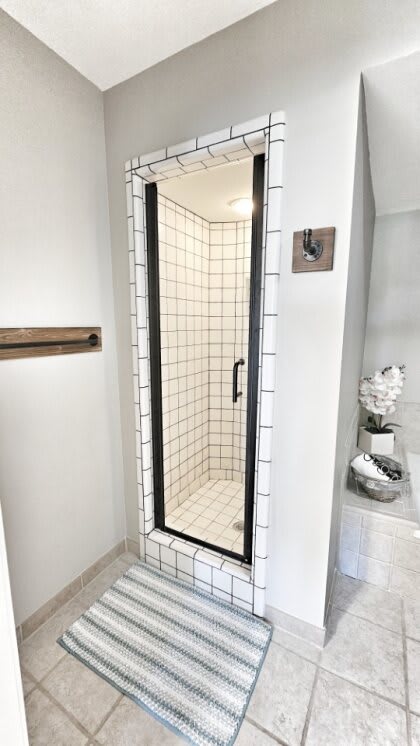 First floor primary bedroom with en suite bathroom