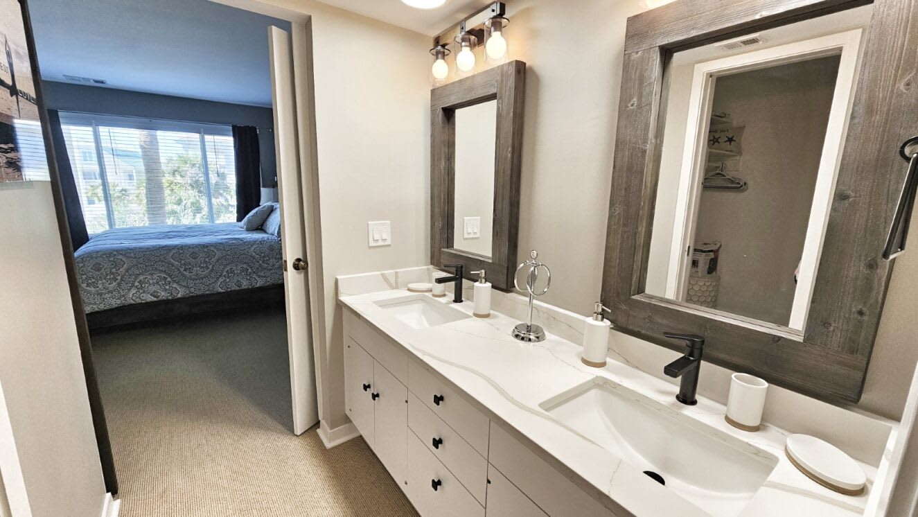 First floor primary bedroom with en suite bathroom