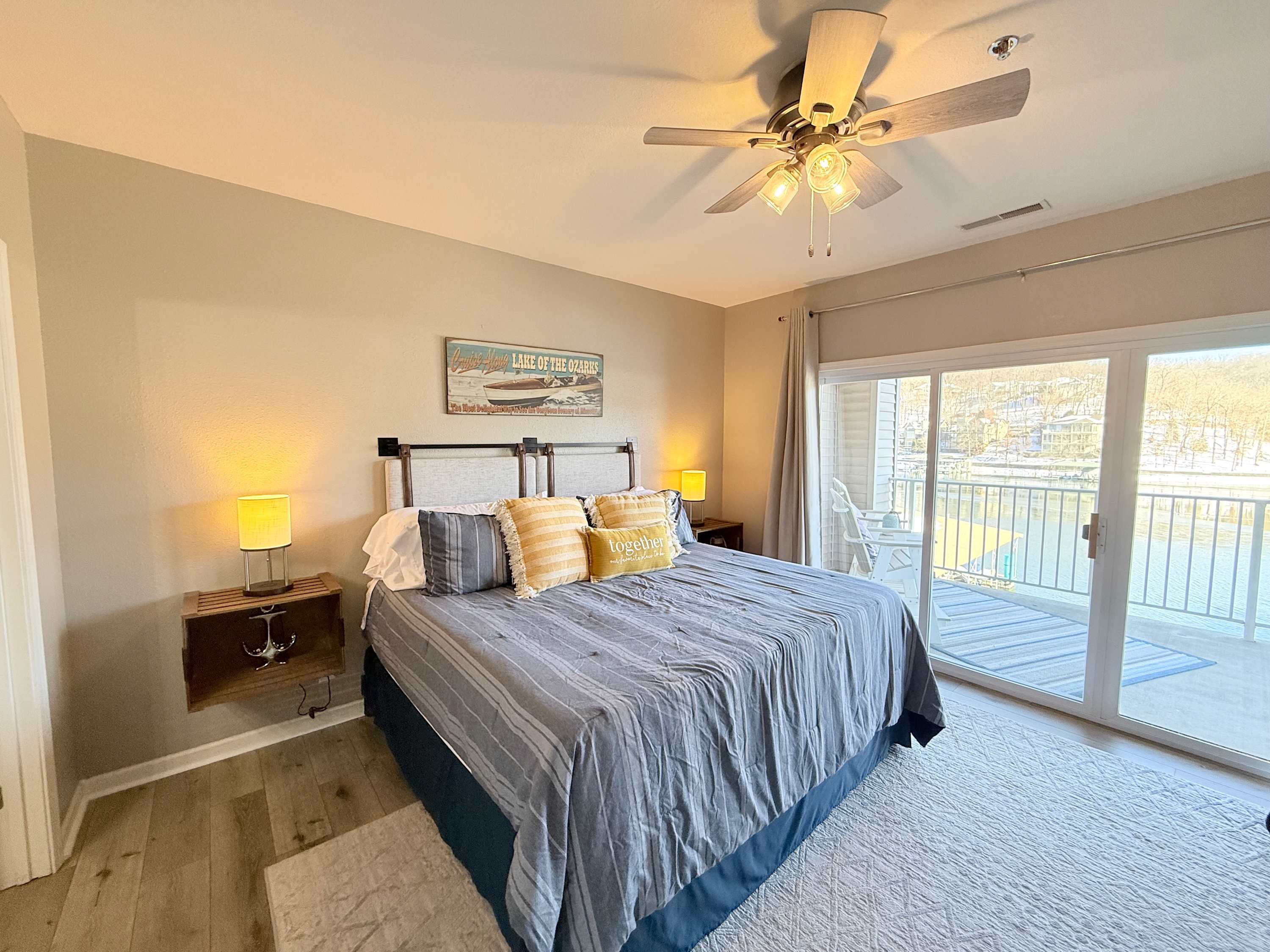 The primary king suite boasts deck access, a smart TV, & an ensuite​