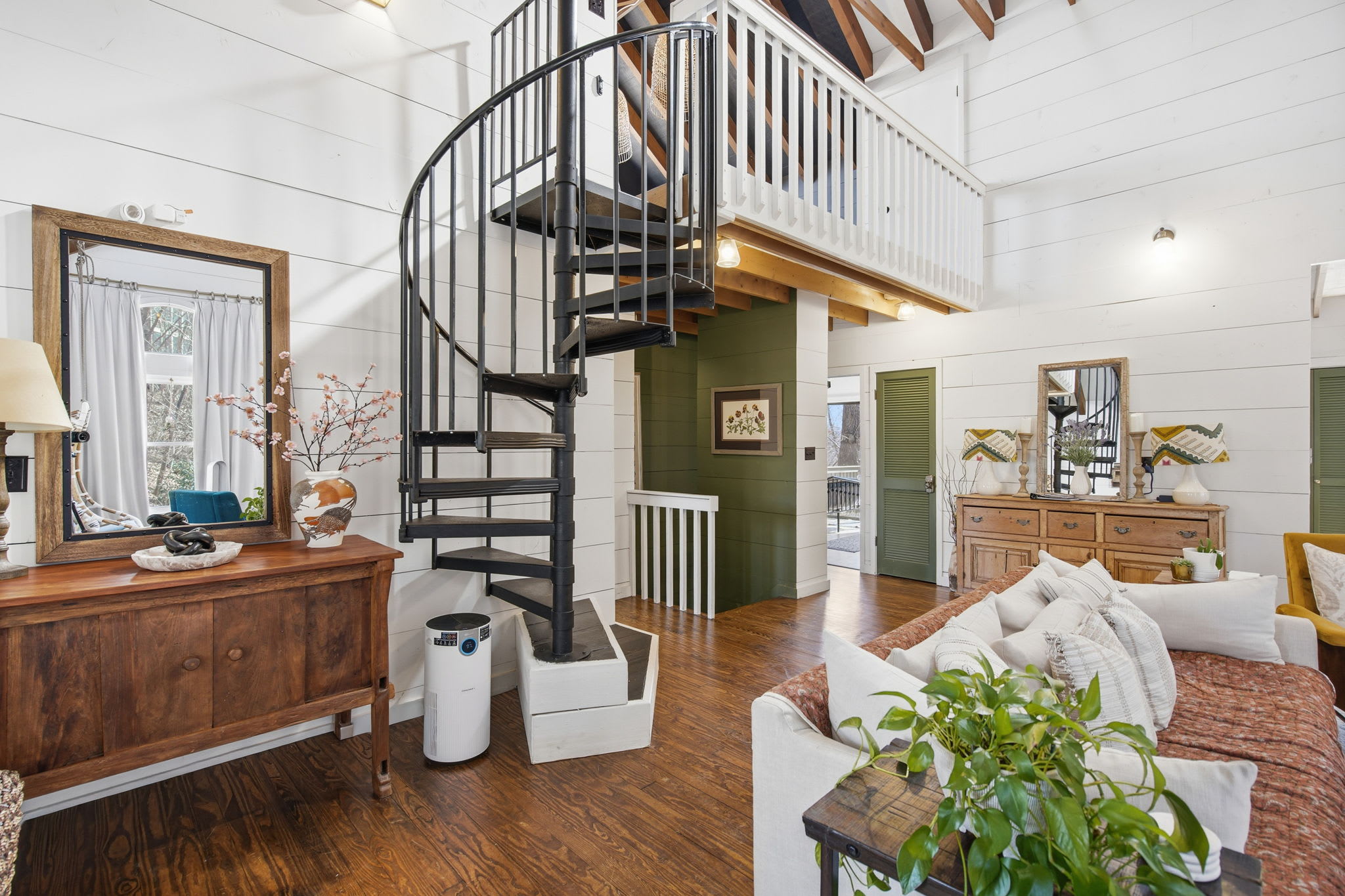 Come home and relax by the fireplace in the gorgeous living room