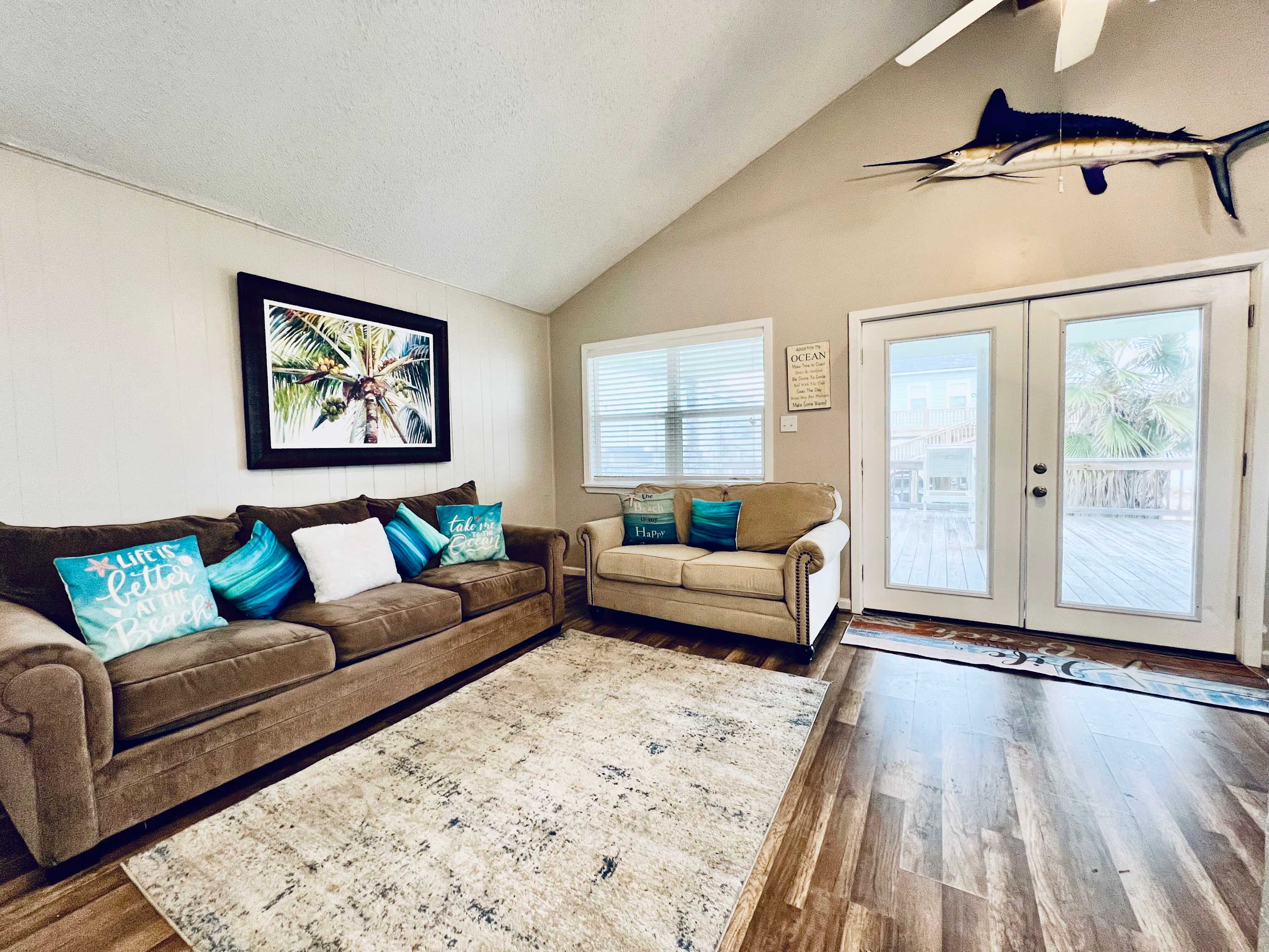 relax in this oversized open living room and enjoy the views