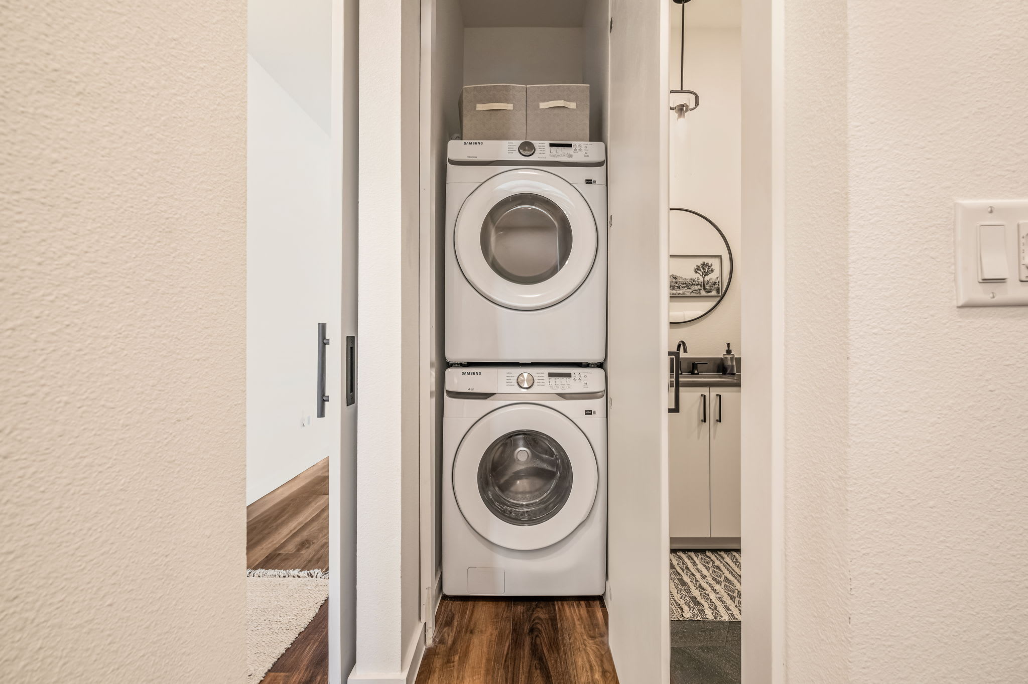 Stacked washer and dryer in the condo