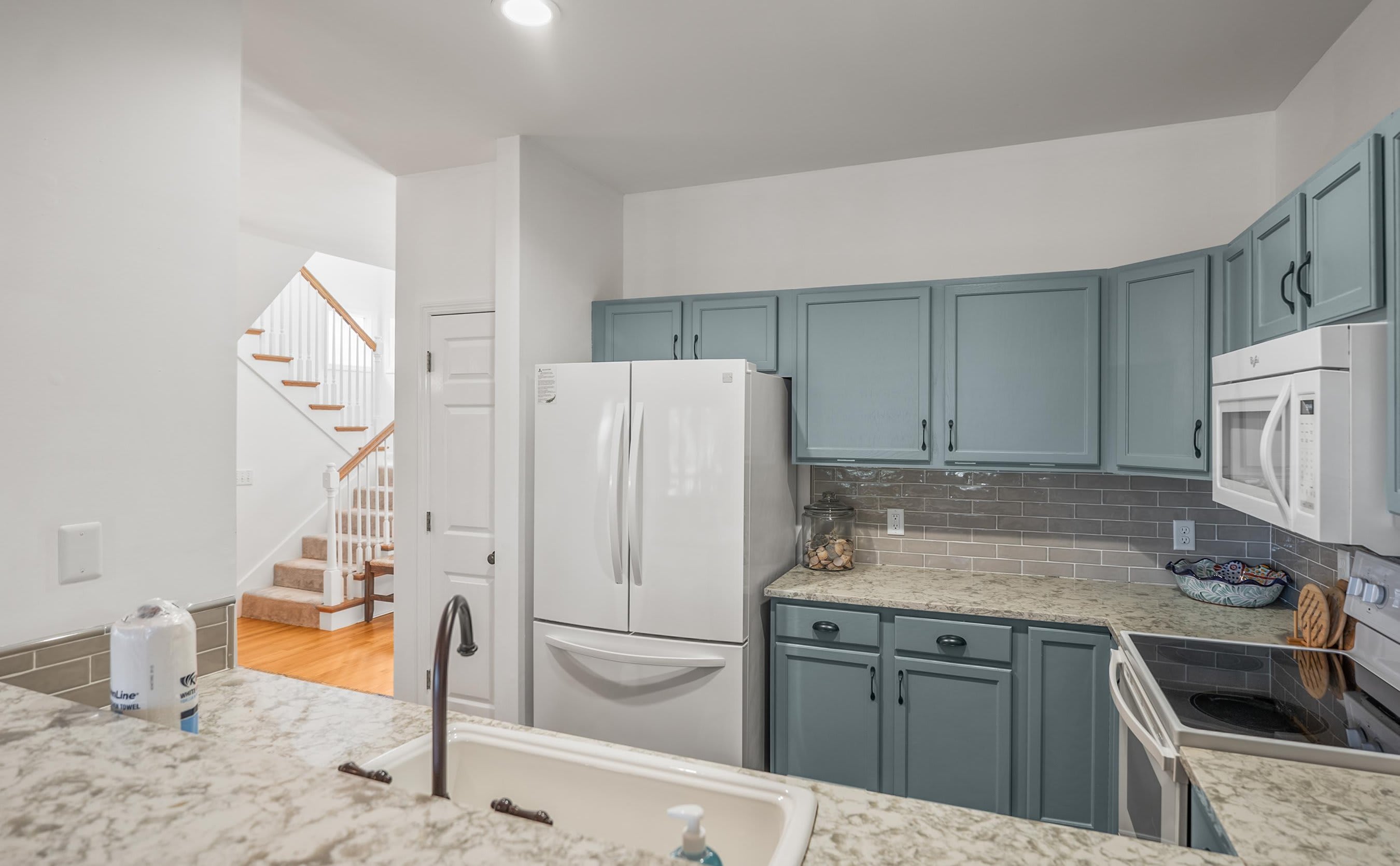 Fully Equipped Kitchen Features Full-Size Appliances