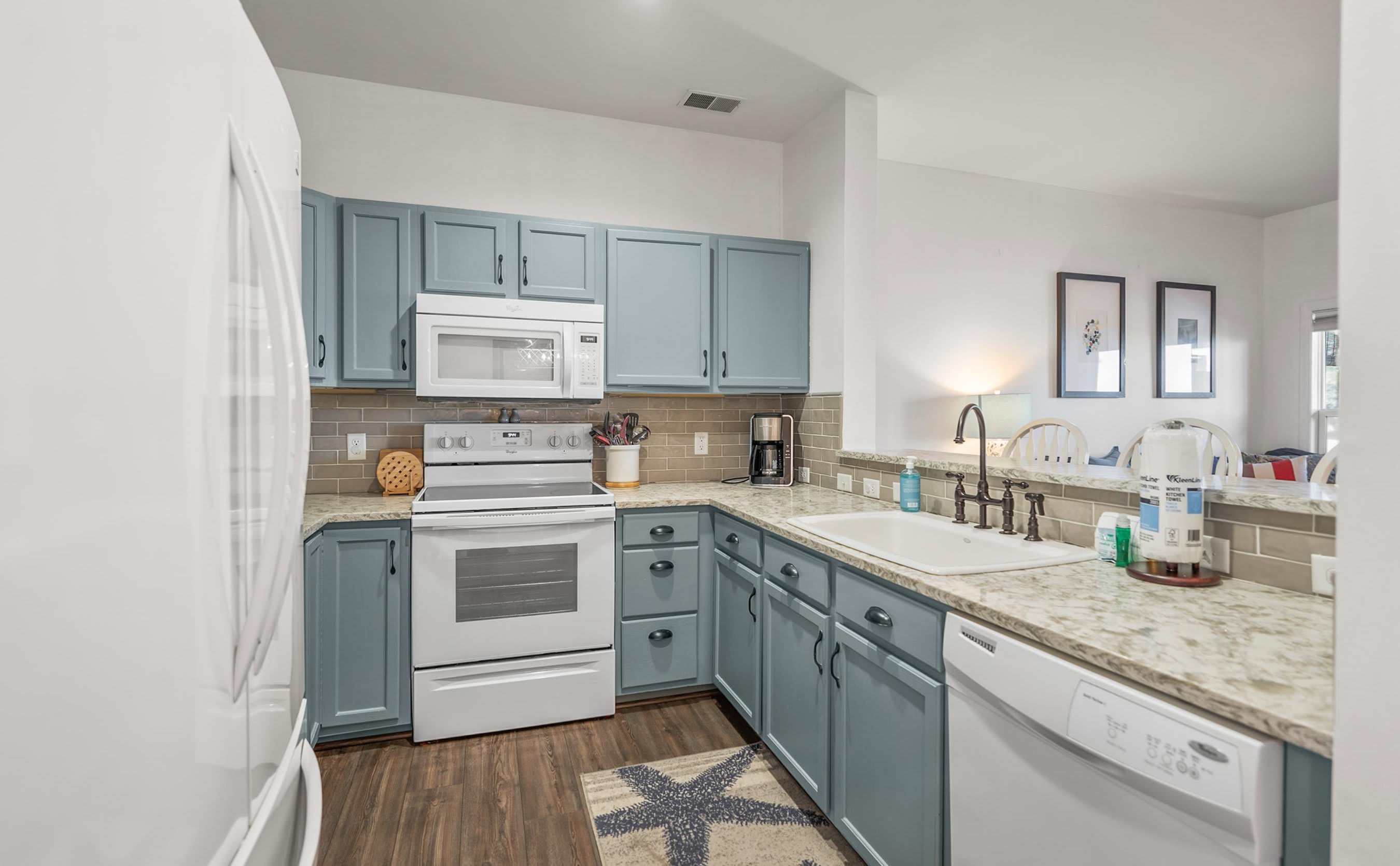 Fully Equipped Kitchen Features Full-Size Appliances