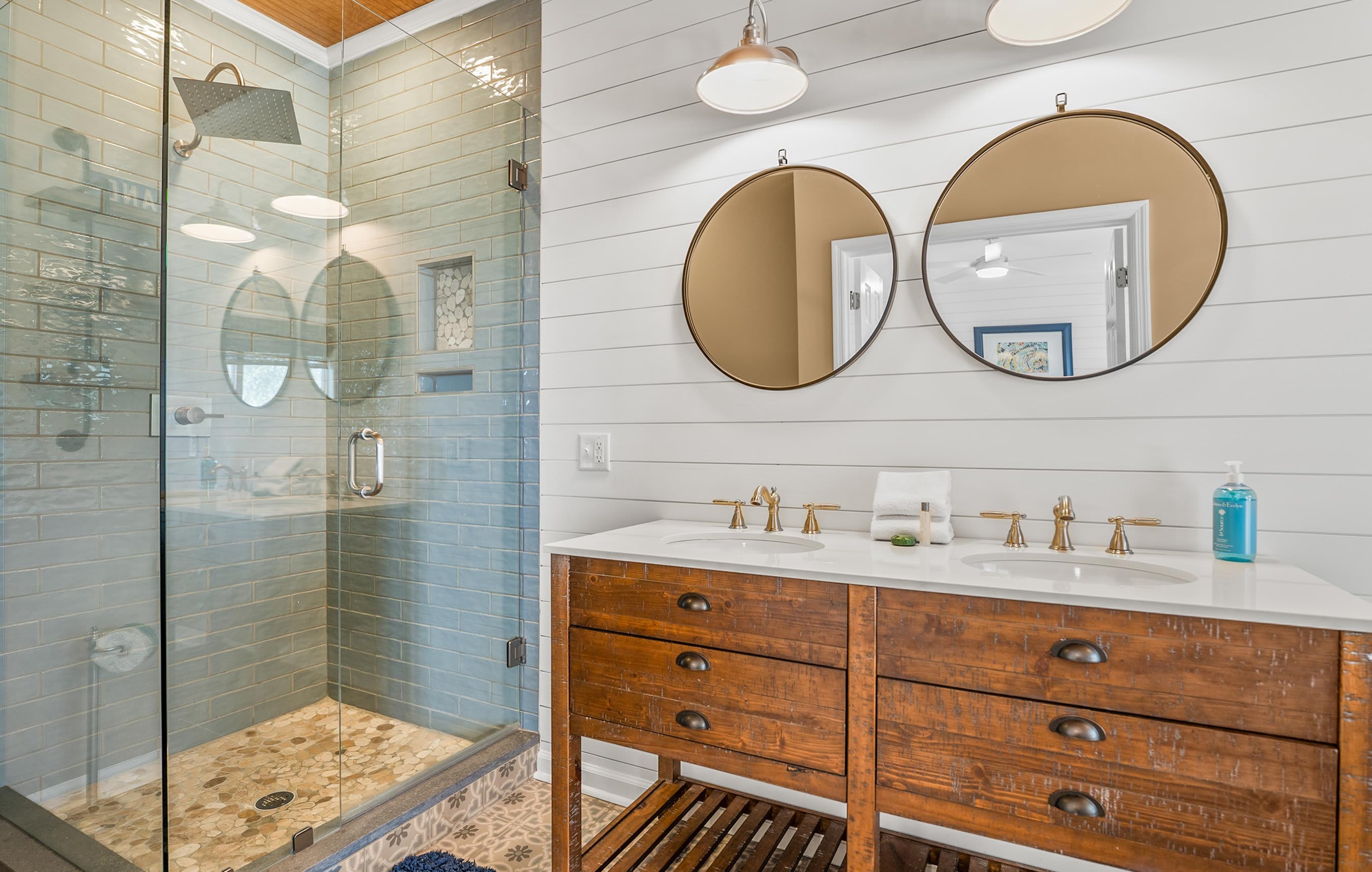 Spa-Like Ensuite with a Freestanding Soaking Tub, Walk-In Shower, and Double Vanity. 