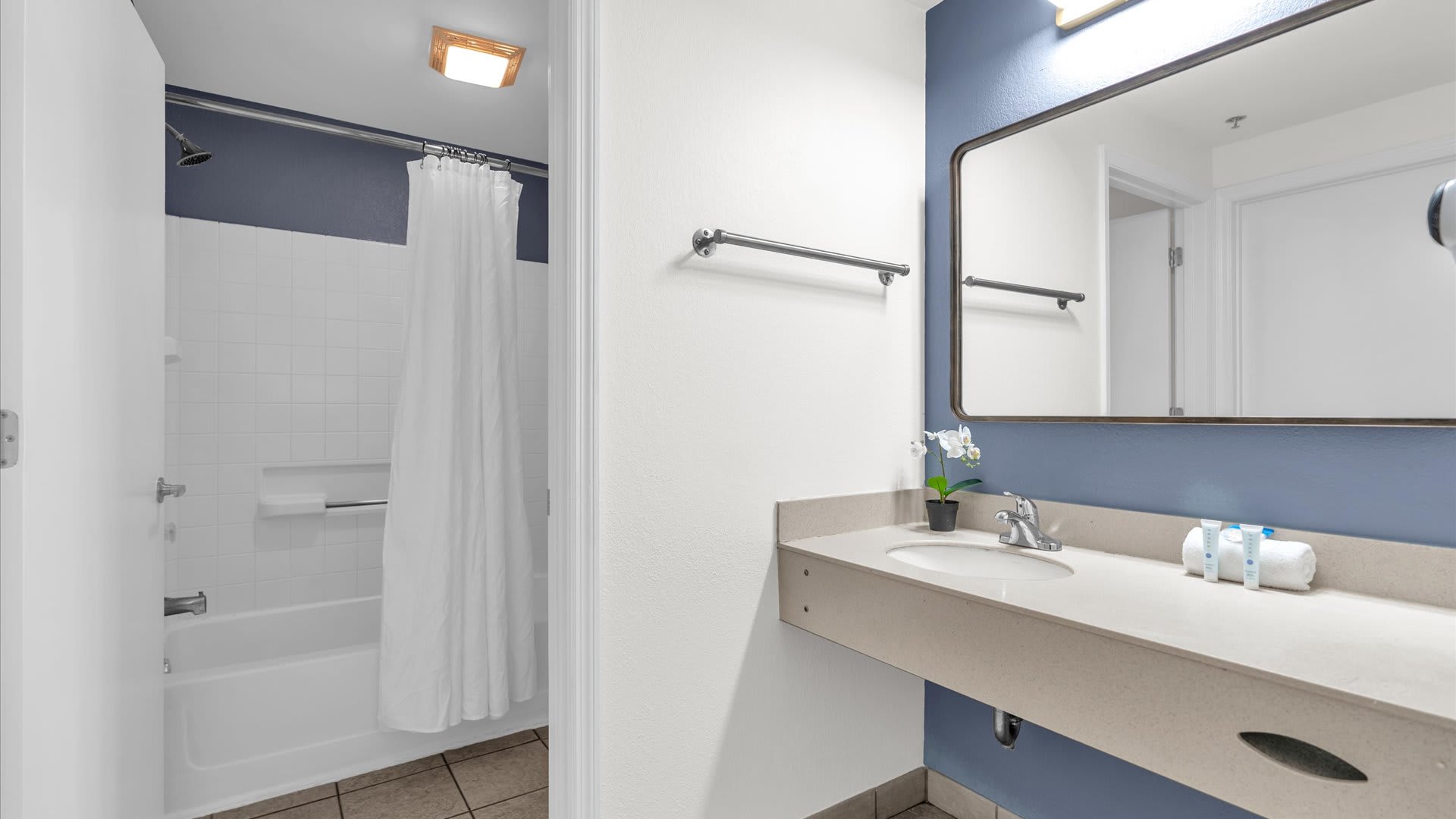 Bathroom vanity with mirror + fresh towels