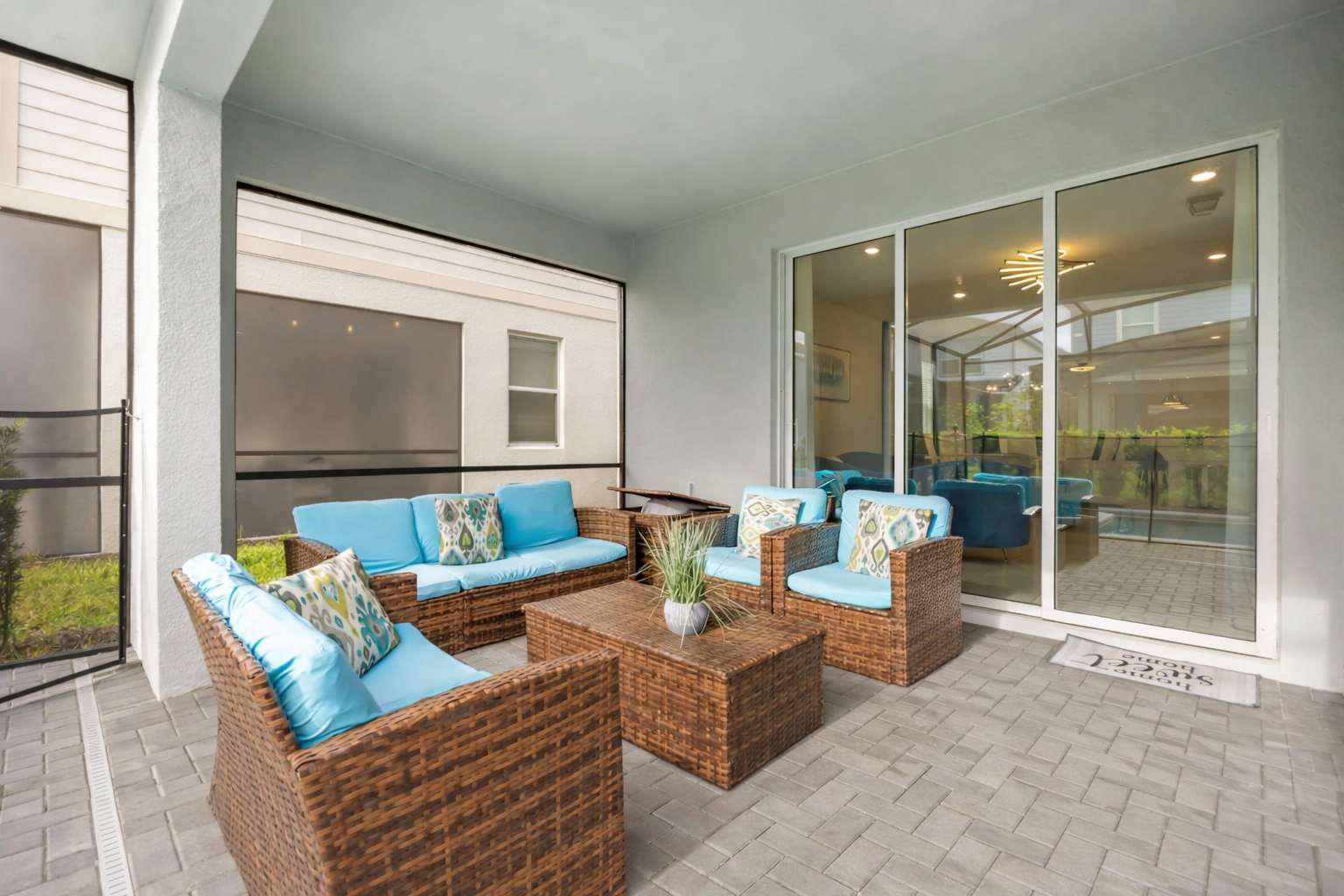 Comfortable outdoor lounge with cushioned seating, perfect for morning coffee or evening cocktails by the pool.