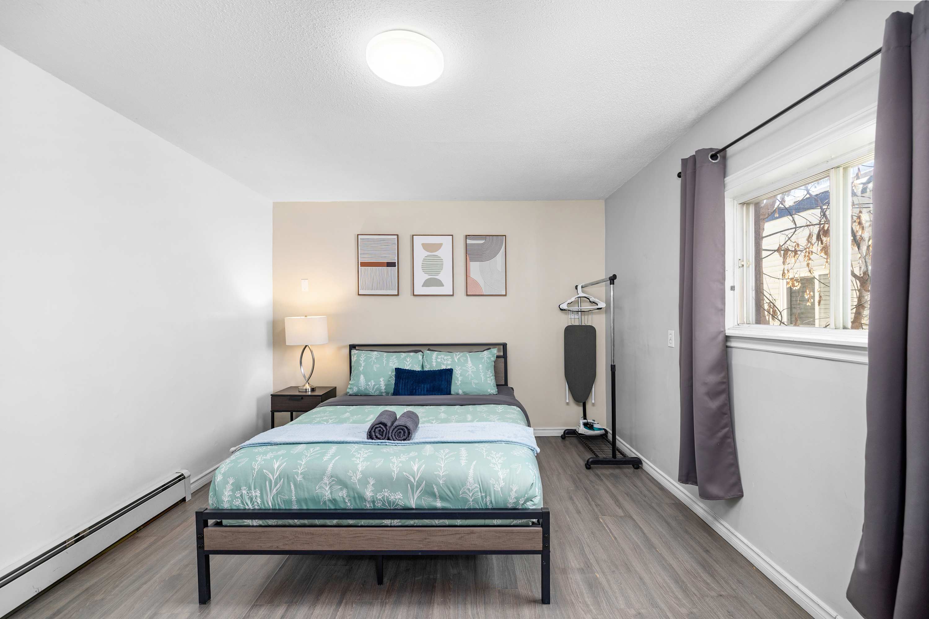 Peaceful bedroom space with a queen bed