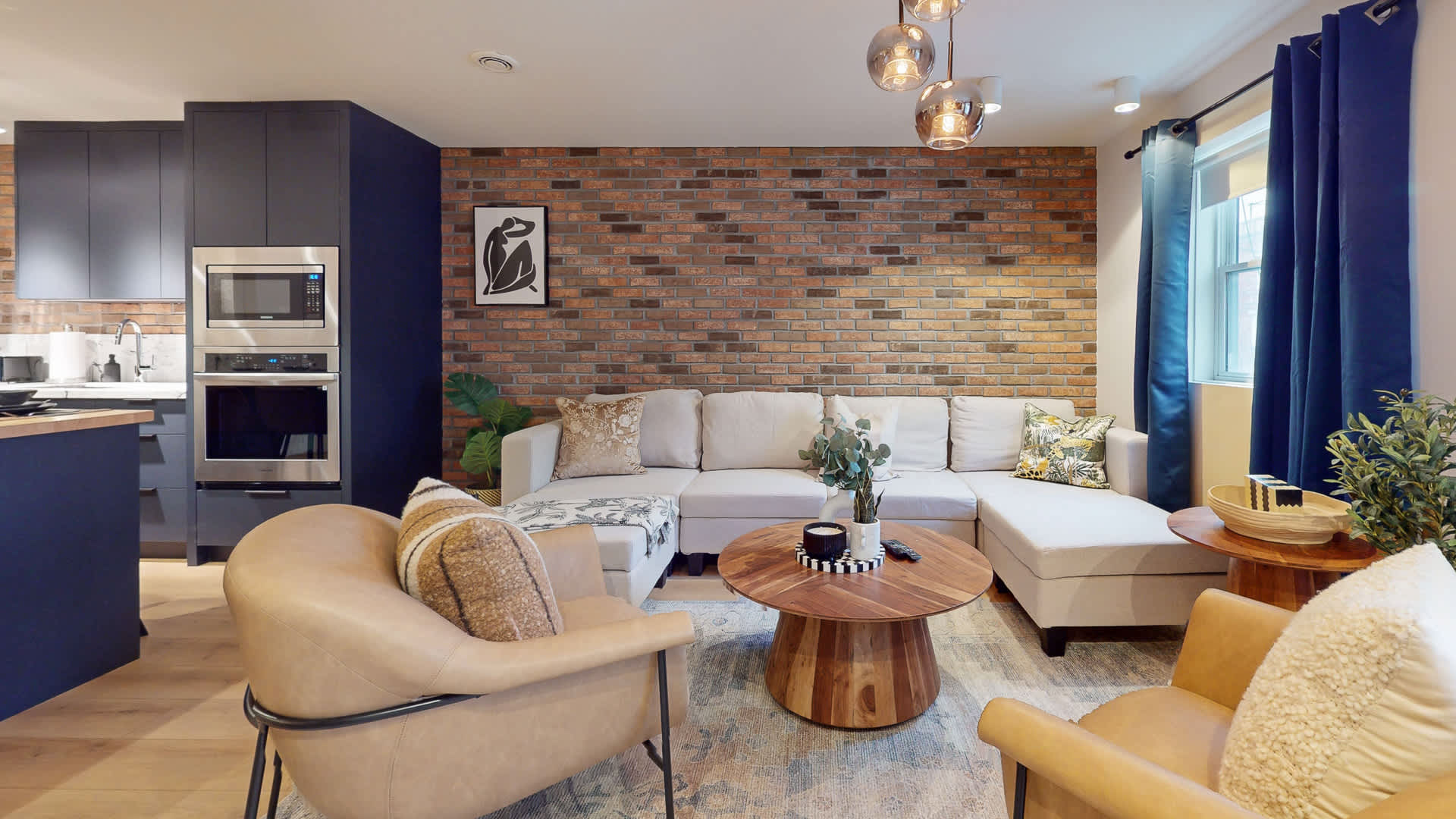 Brick accents, warm tones, and space to gather.