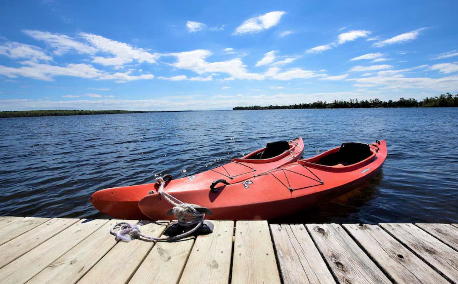 Waterfront views with kayaks ready to go — lakeside days start right from the dock.