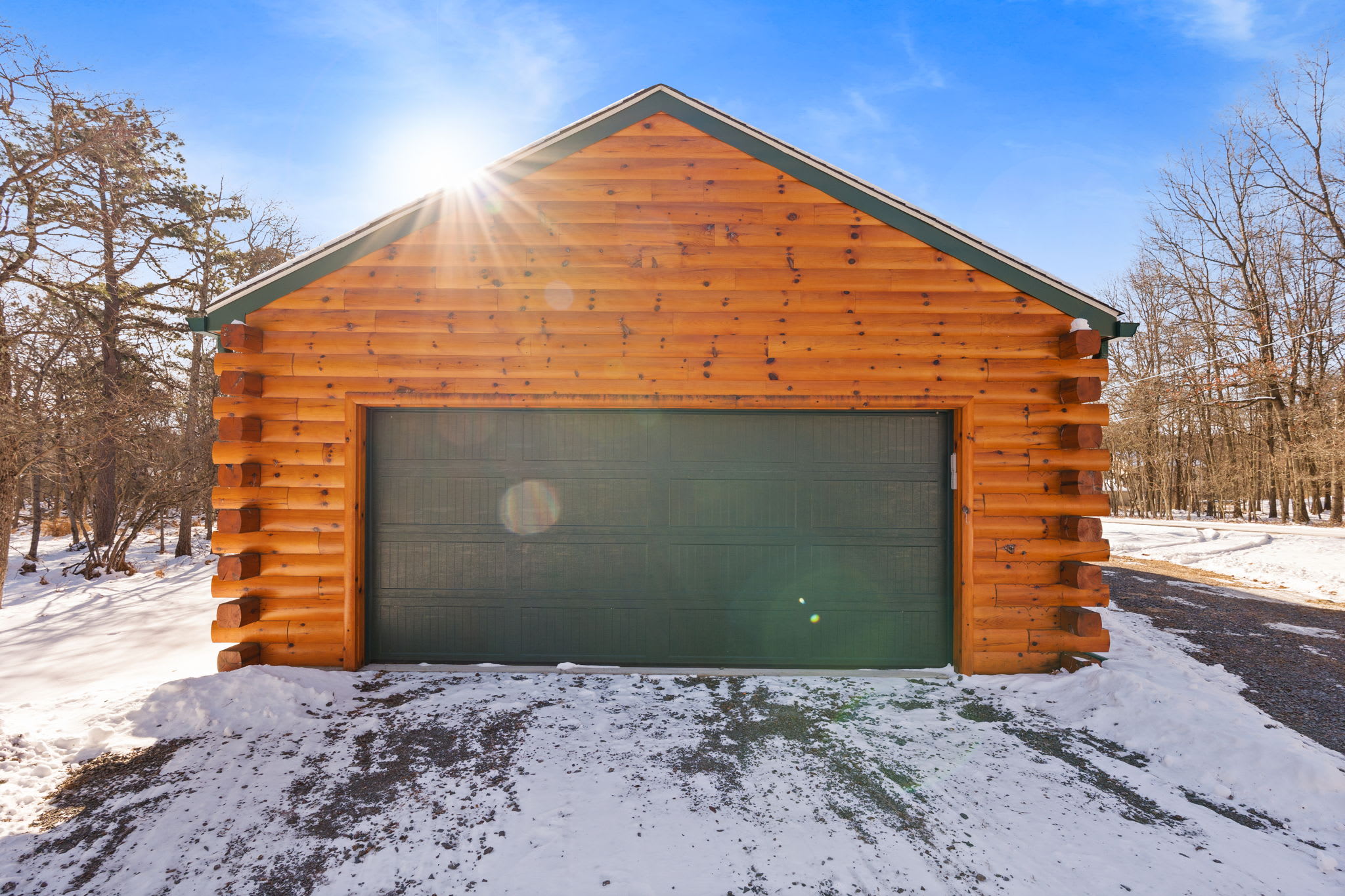 The cabin includes a two-car garage for easy winter arrivals
