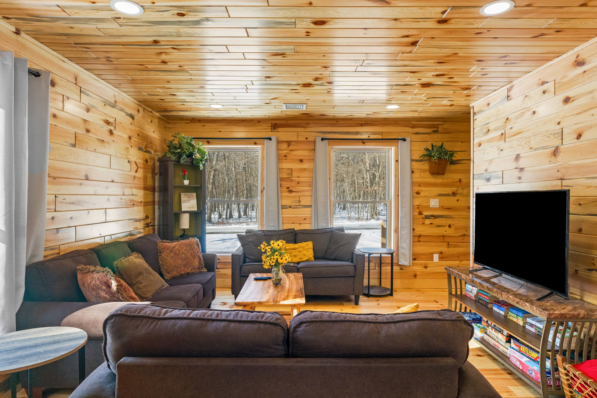 Grab a board game from the shelf and unwind on the sofa after a day of adventure