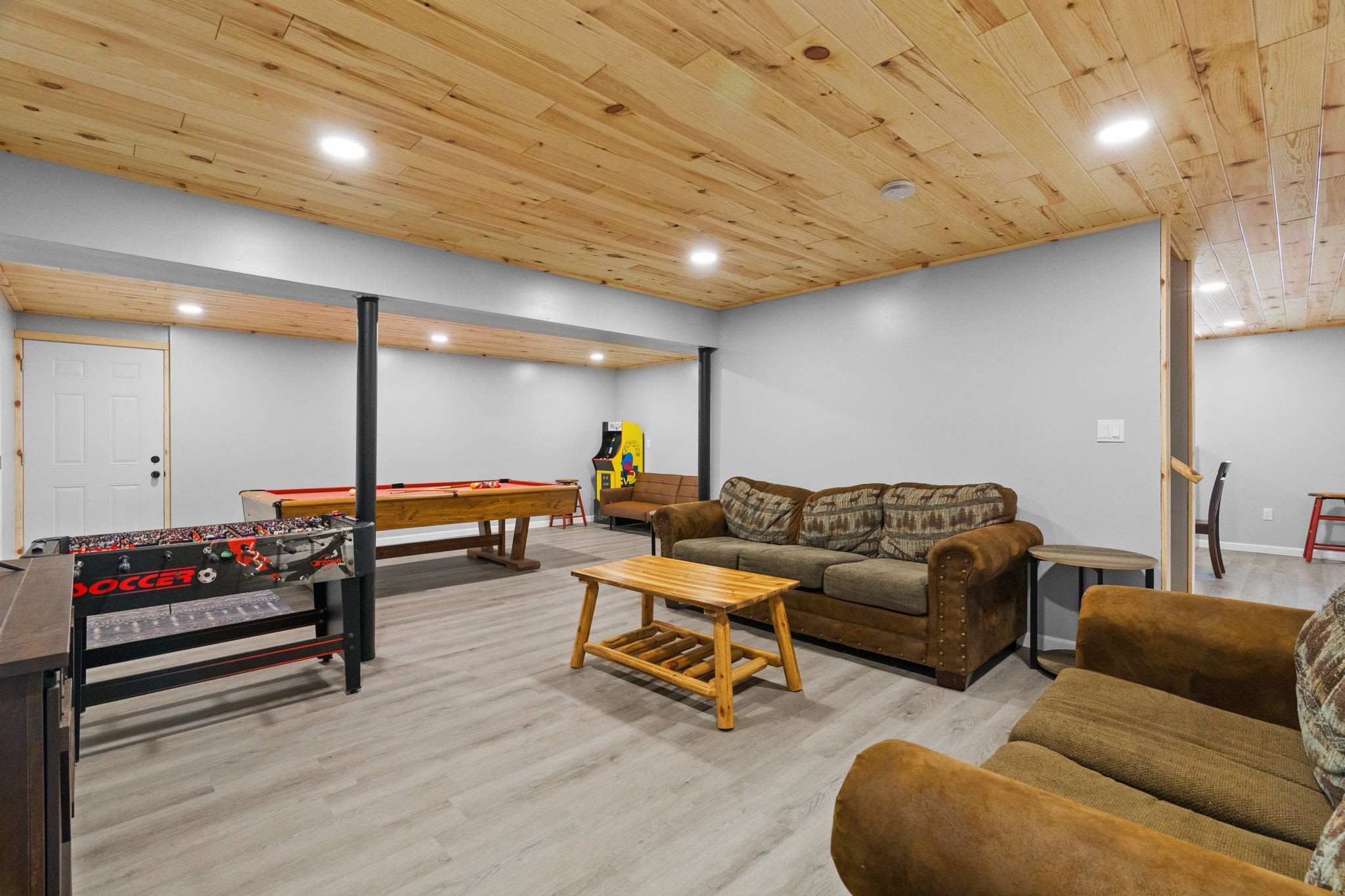 Foosball, pool, and an arcade machine keep the whole crew entertained