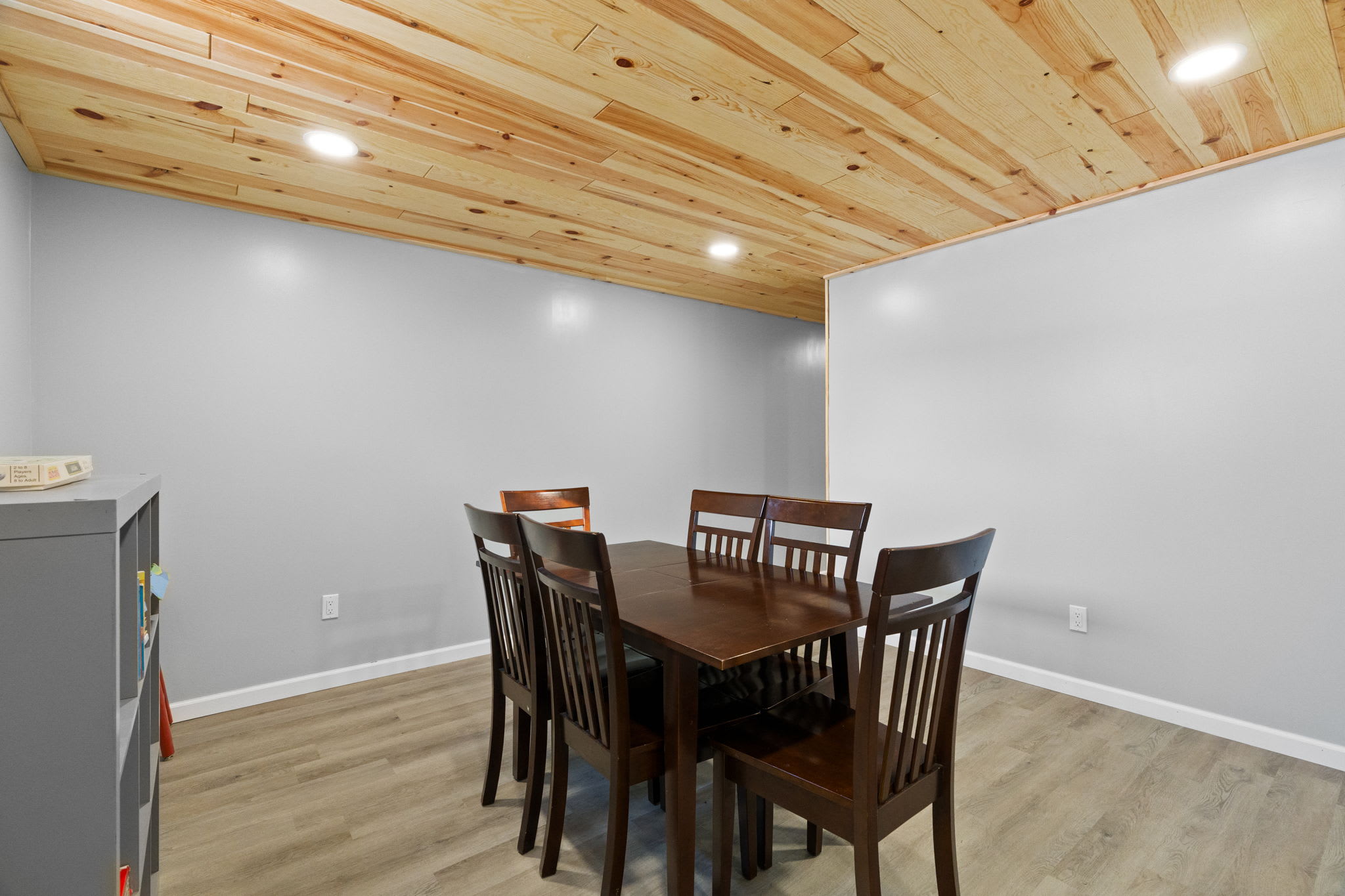 Lower-level dining area seats six for game night dinners or family gatherings