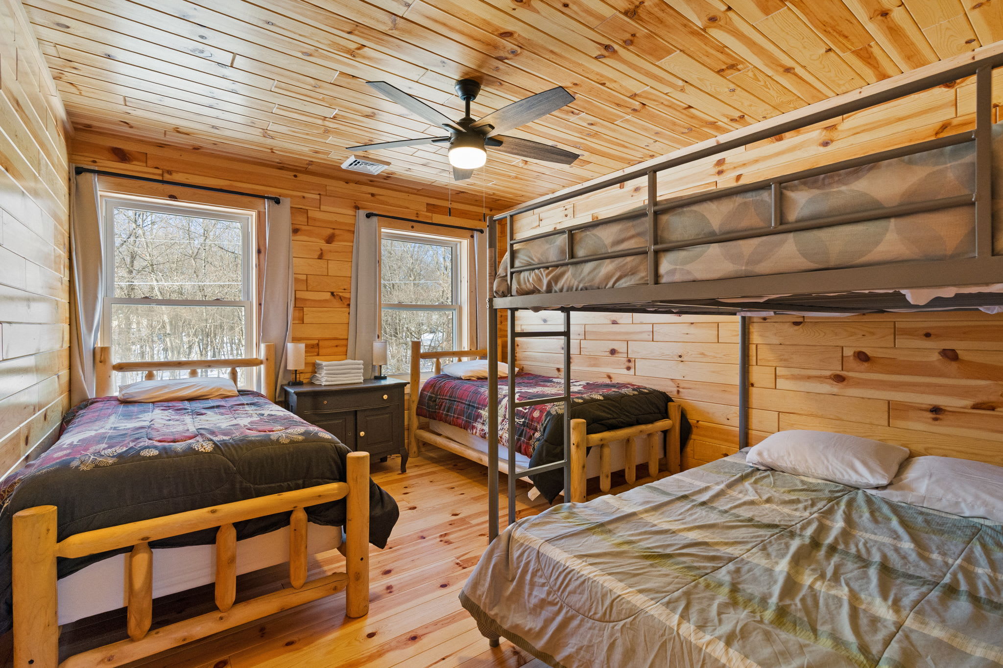 The kids will love the bunk room with its own cozy space and woodland views