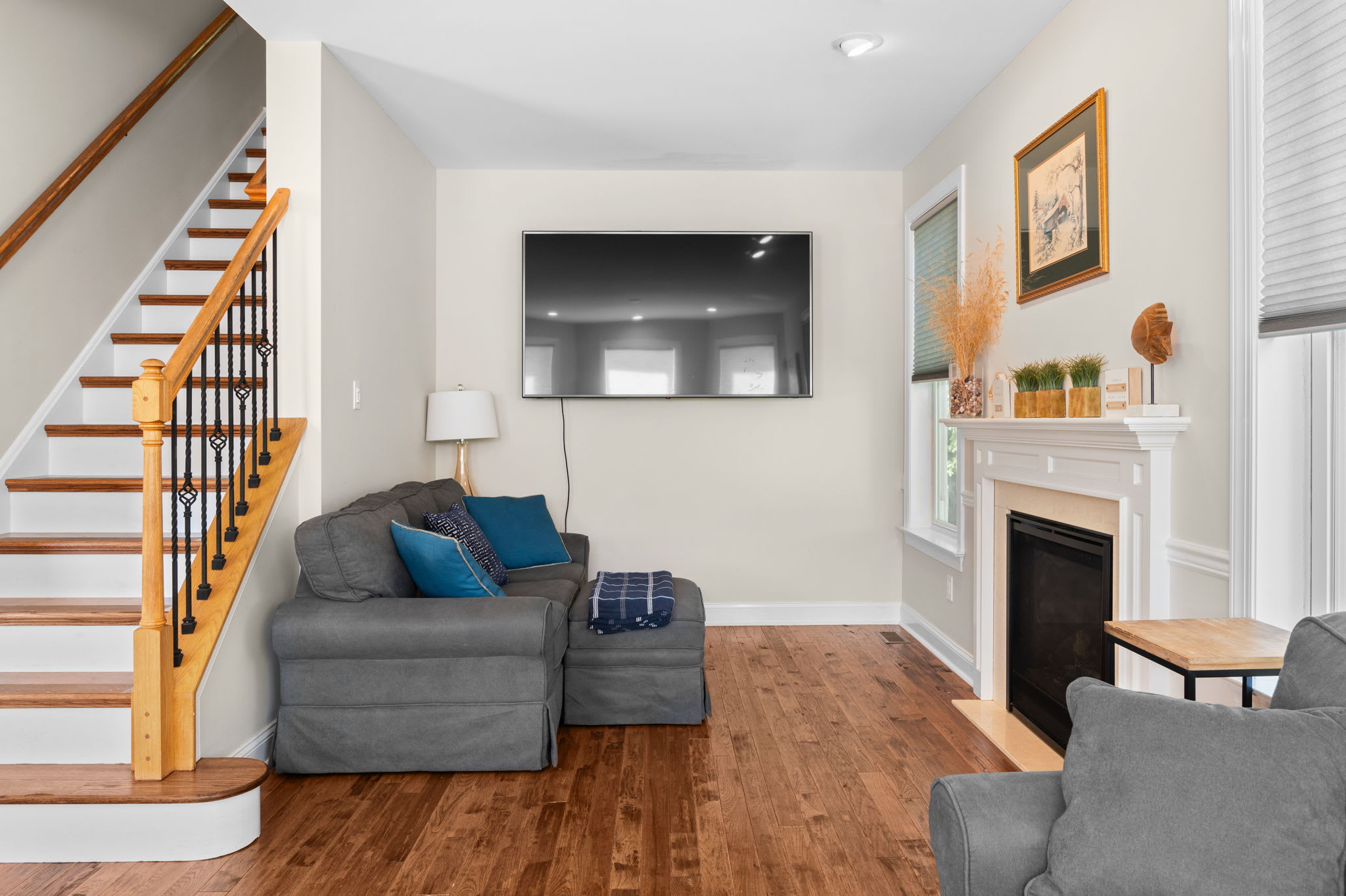 Open floor plan connects the staircase, dining area, and living room seamlessly