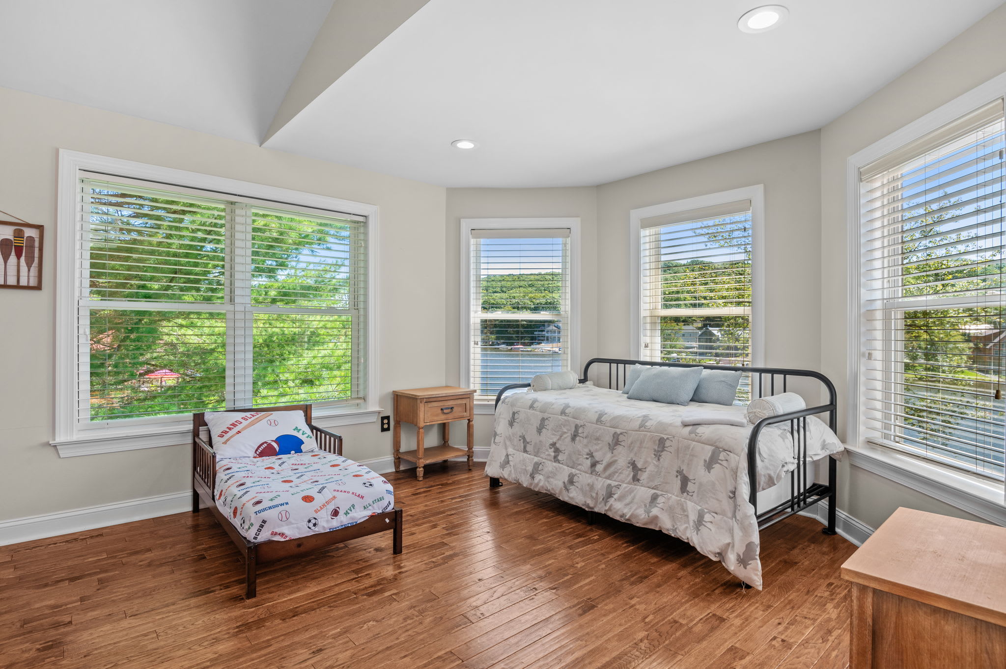 Wake up to treetop views in the spacious master bedroom with vaulted ceilings