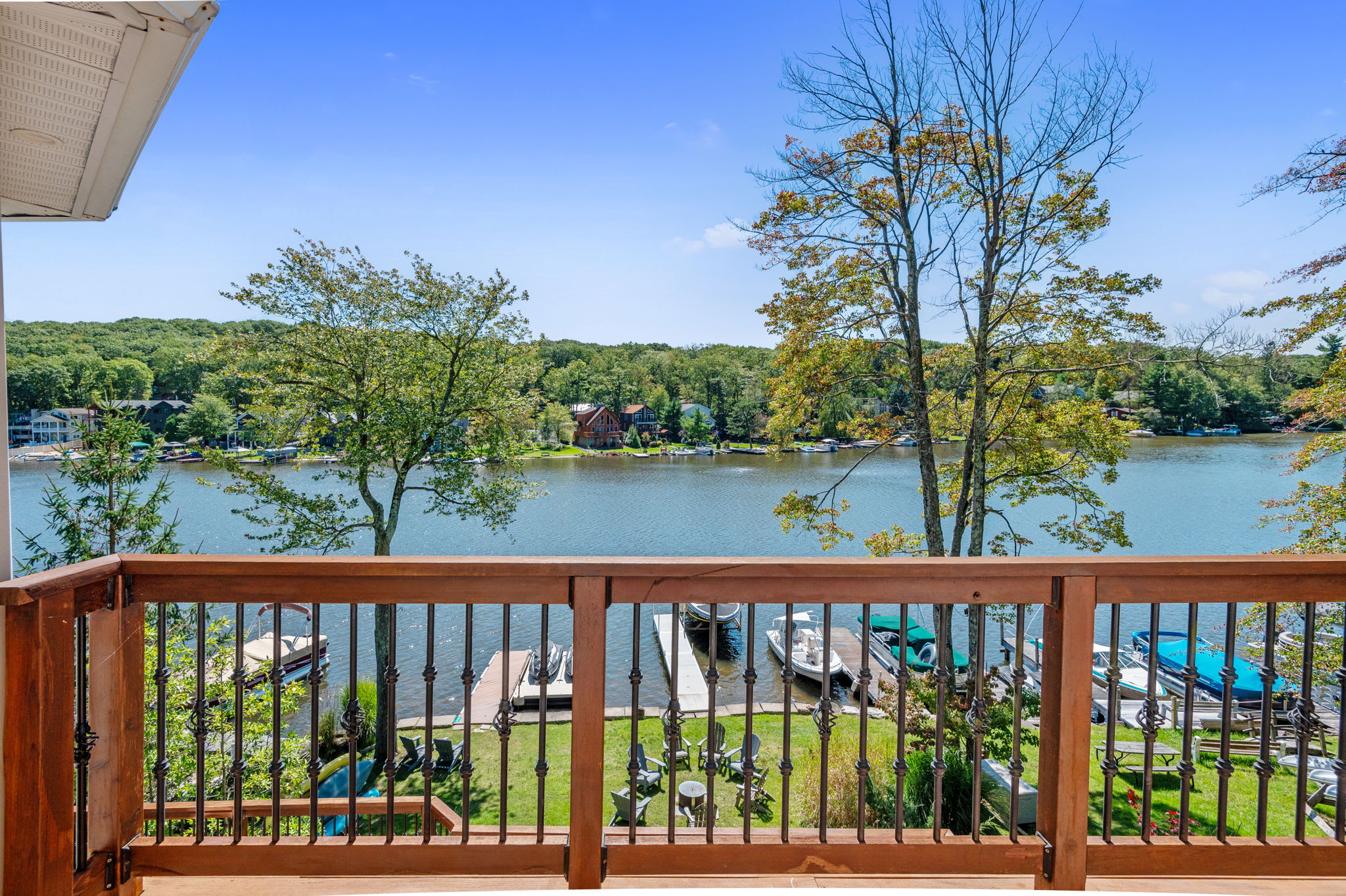 Step out to the deck for stunning views of the lake and surrounding docks