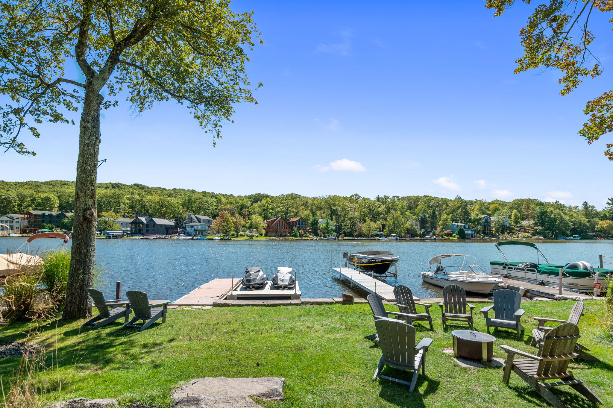 Walk down the green lawn to the dock and enjoy a day on the lake