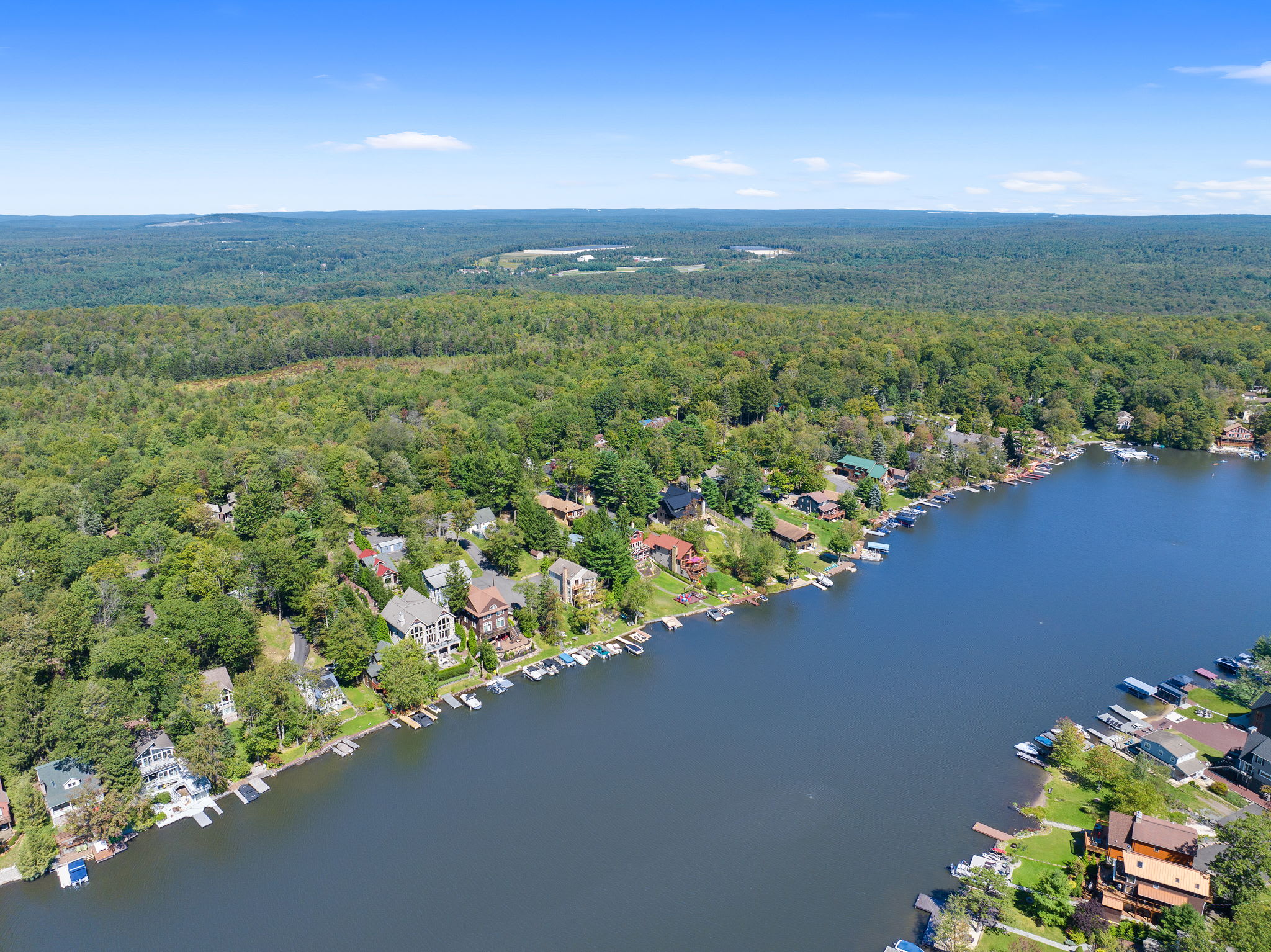 A bird's eye view of the lakefront community and sparkling water