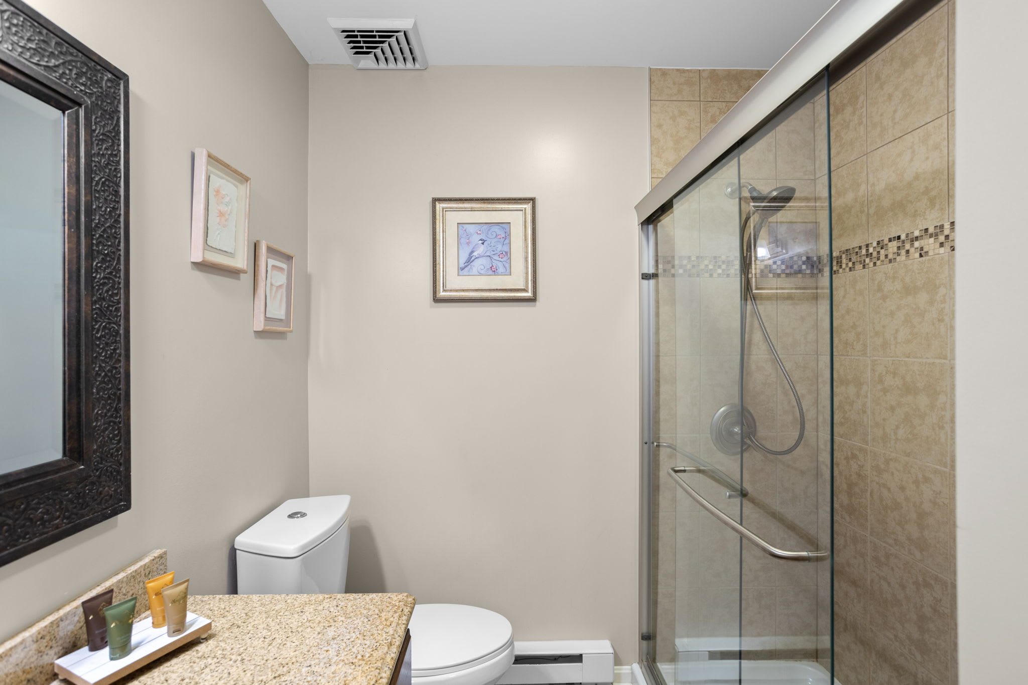 A second bathroom with a shower for convenience