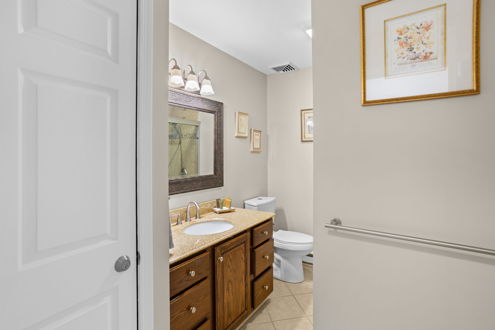 A clean and well-lit bathroom for freshening up after the lake