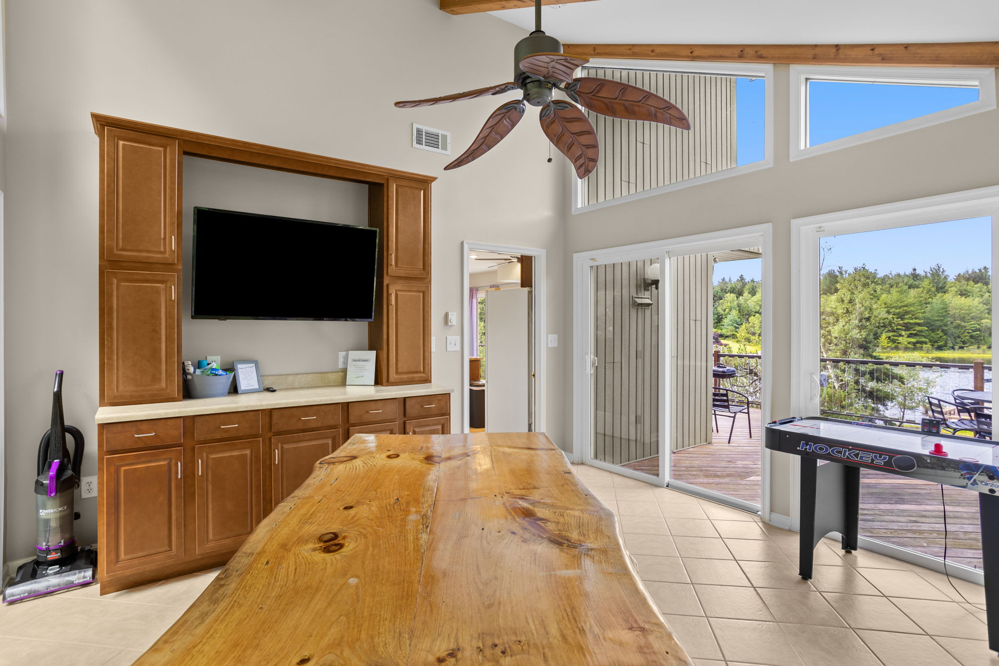 Watch your favorite show or slide the doors open for a lake view