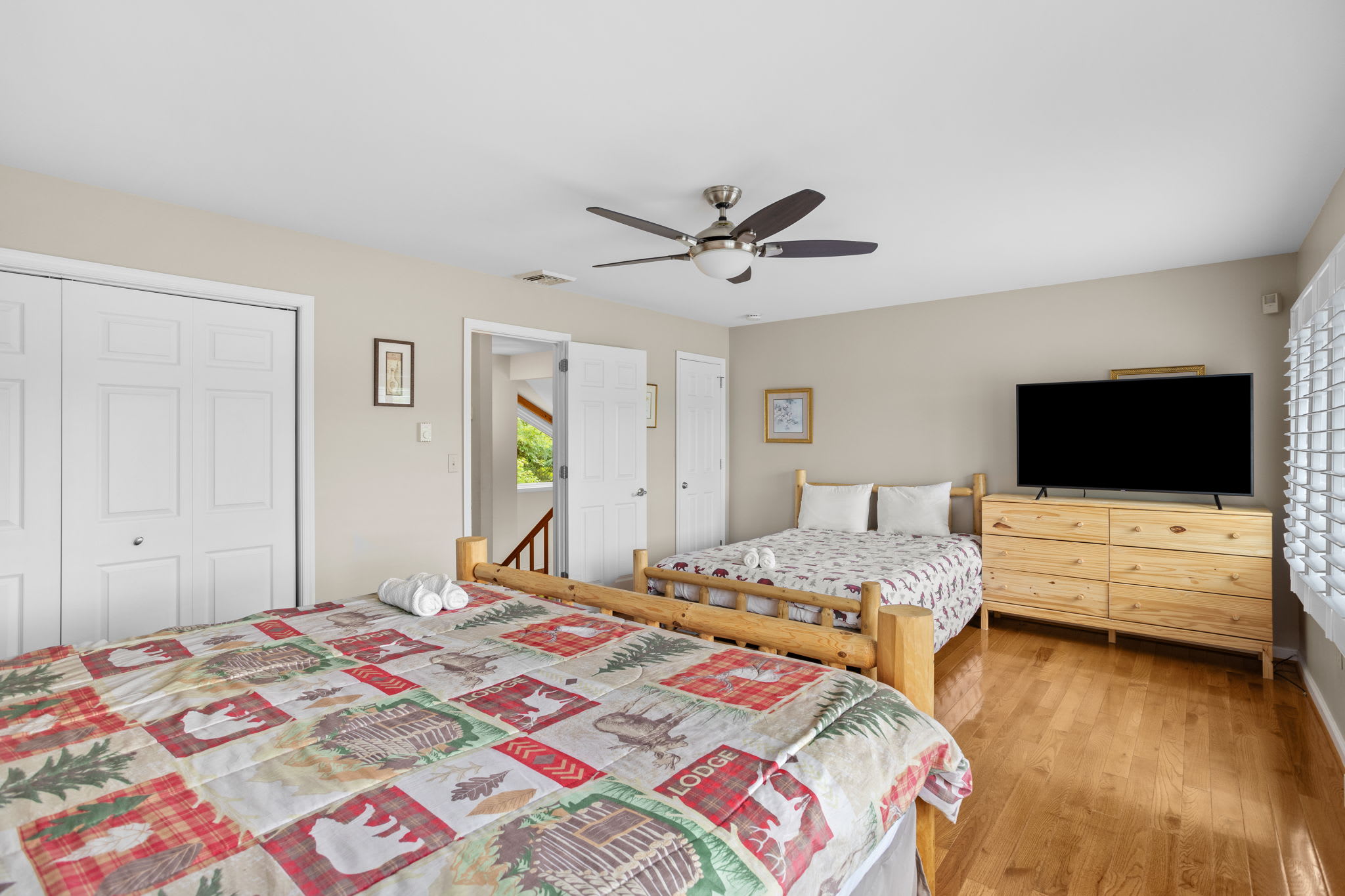 The lower-level den is perfect for movie nights and downtime