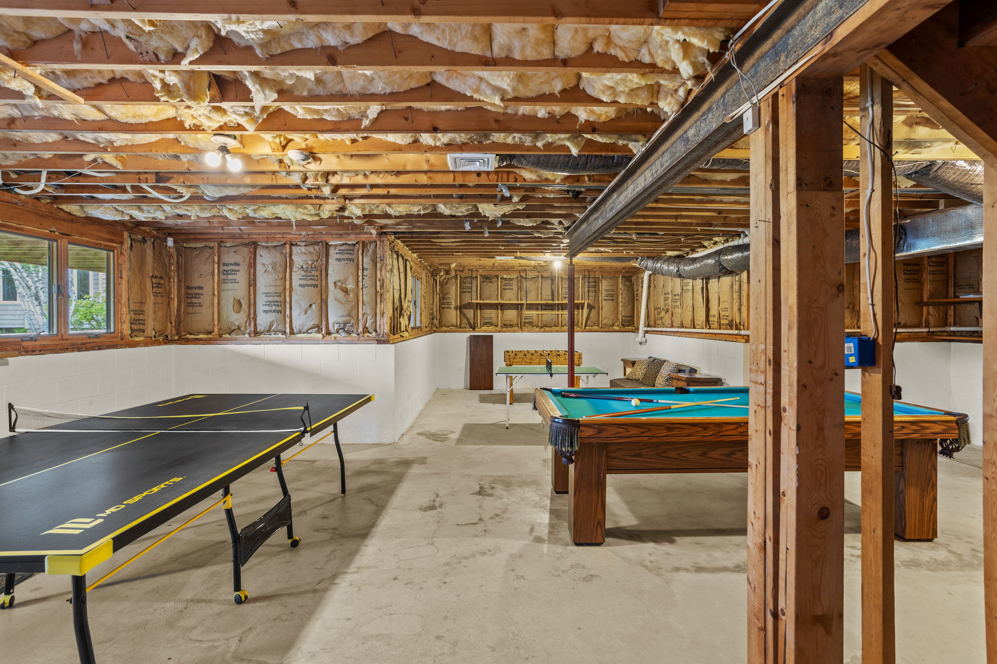 Foosball and pool keep the fun going in the game room