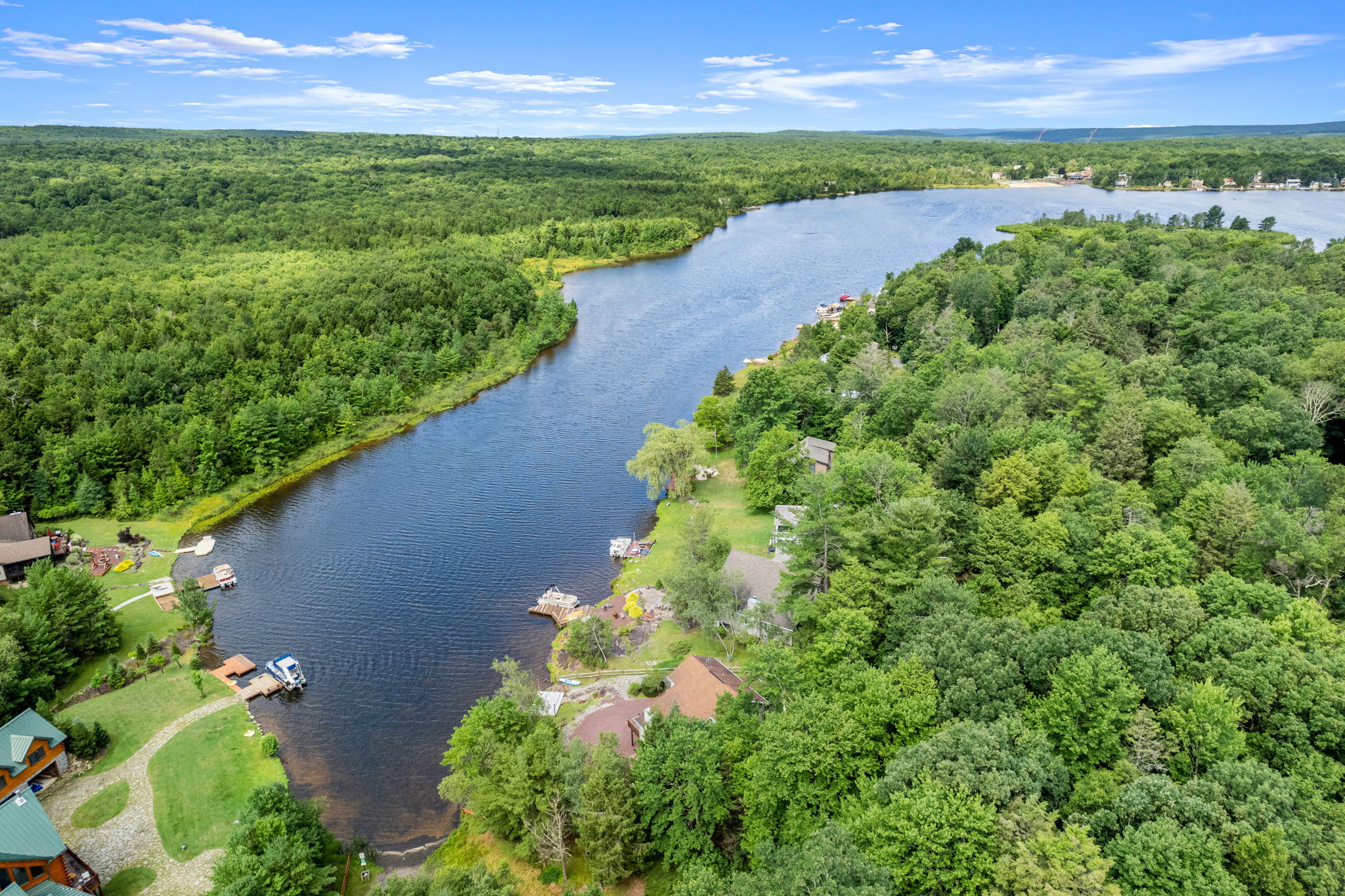 Endless greenery and sparkling lake views from above the Poconos