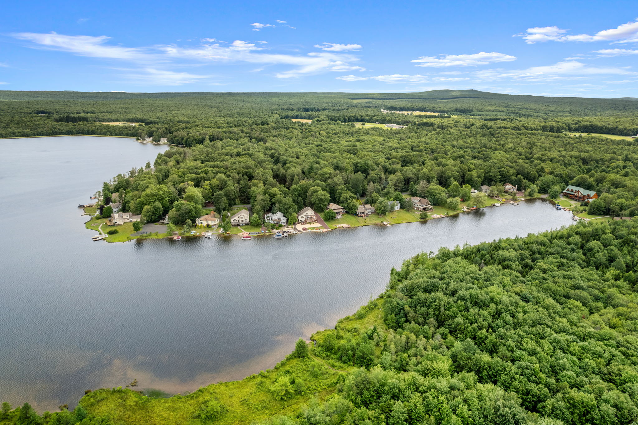 The home sits right on the water with a gorgeous lake backdrop