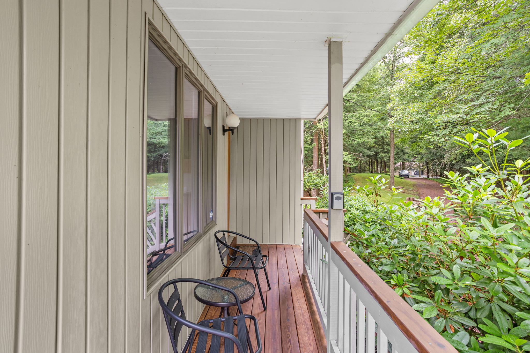 Settle into the covered porch and listen to the sounds of nature