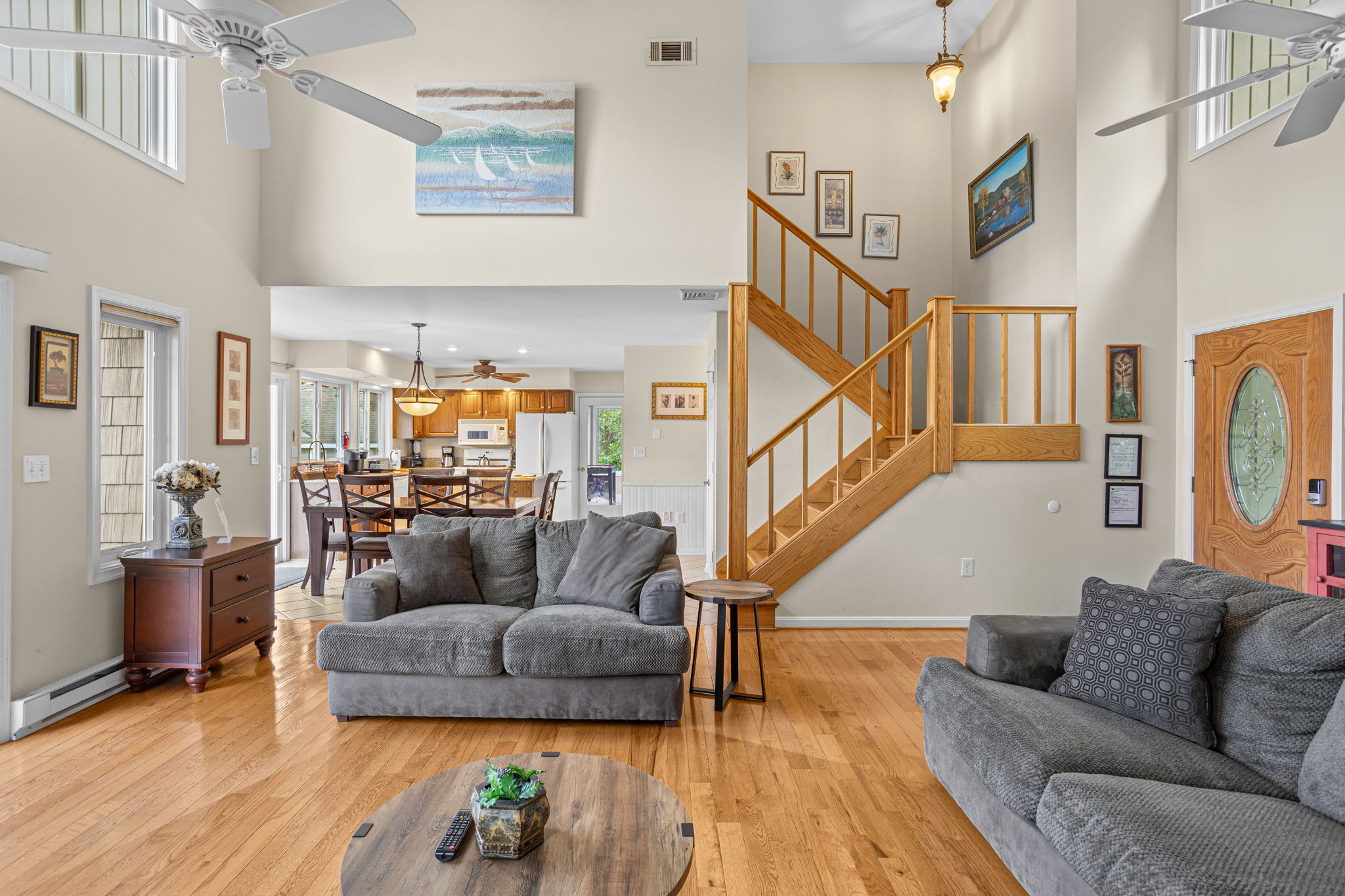 The staircase leads up to more cozy spaces under the beams