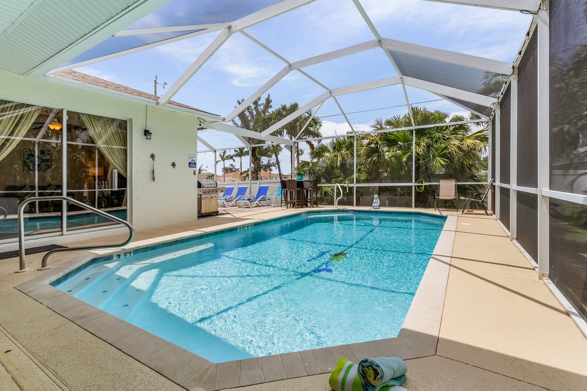 Sunny Paradise Villa with HTD Pool, Game Room, And Privacy | Cape Coral | Coastal Haven Homes