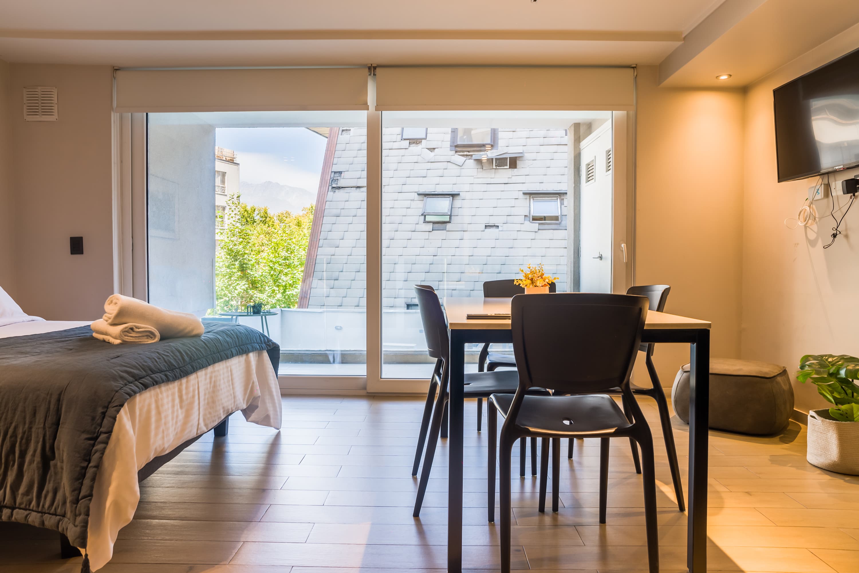 Cozy studio with a stunning city view, perfect for a relaxing stay with modern amenities.