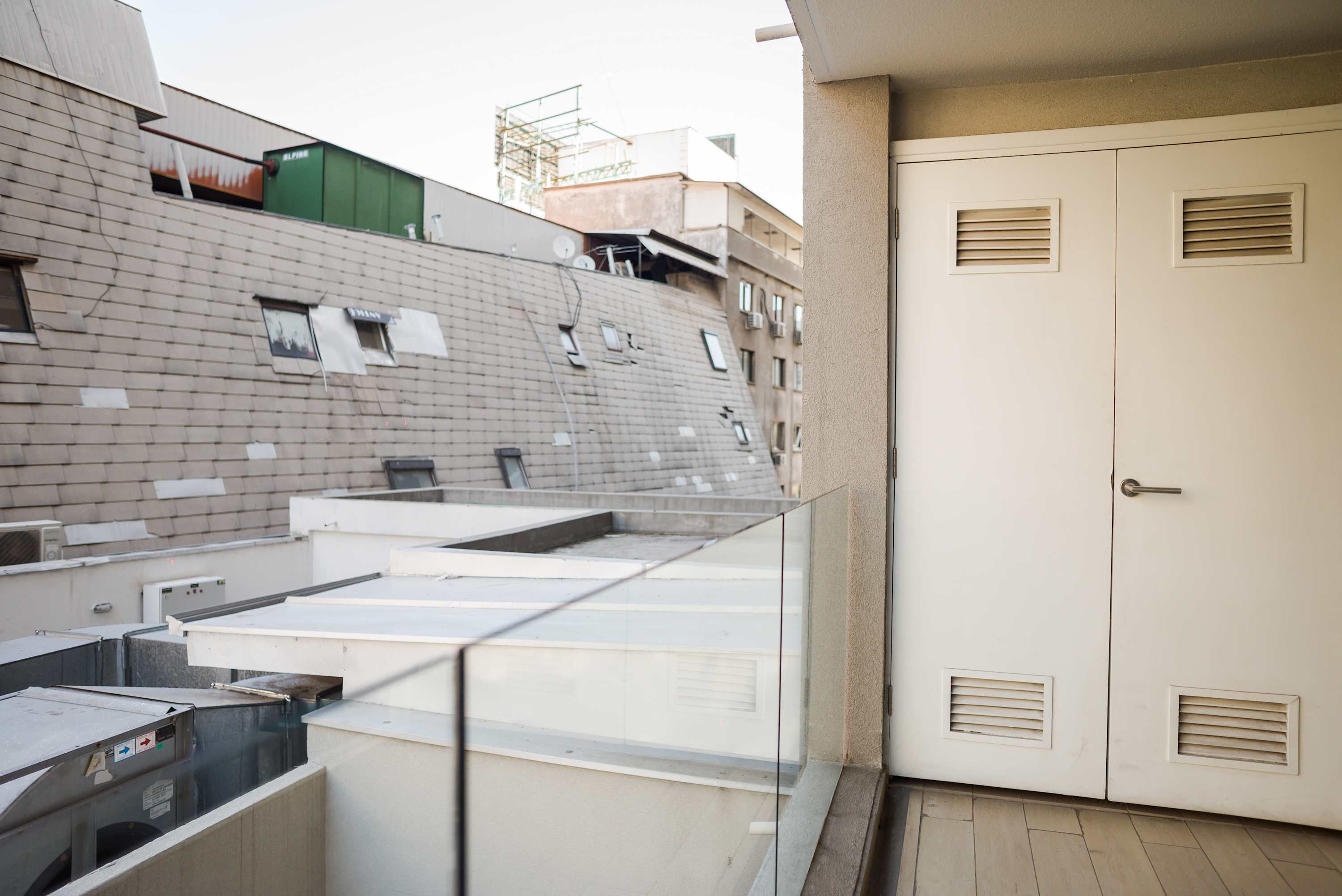 Relax on your private balcony with city views, perfect for unwinding after a day of exploring.