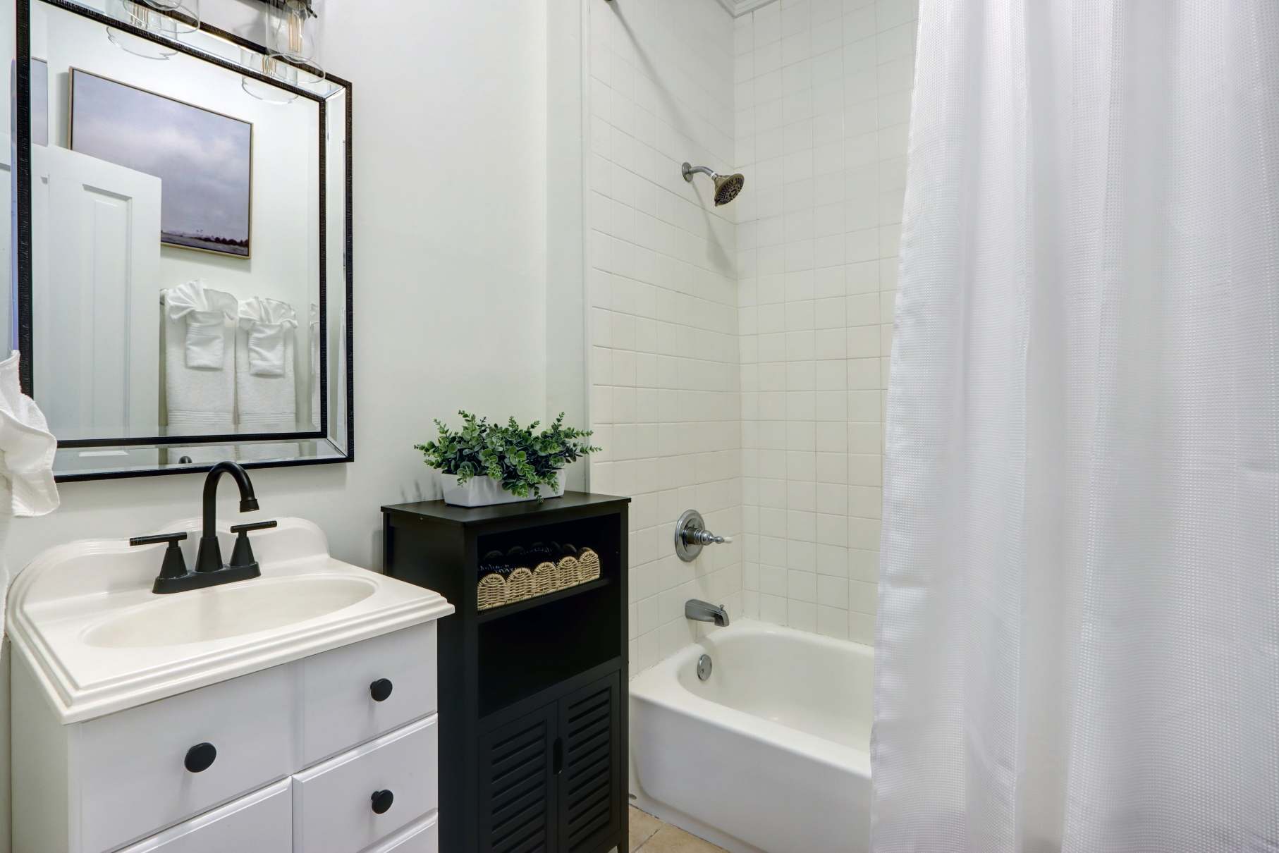 Full bath downstairs just outside bedroom.
