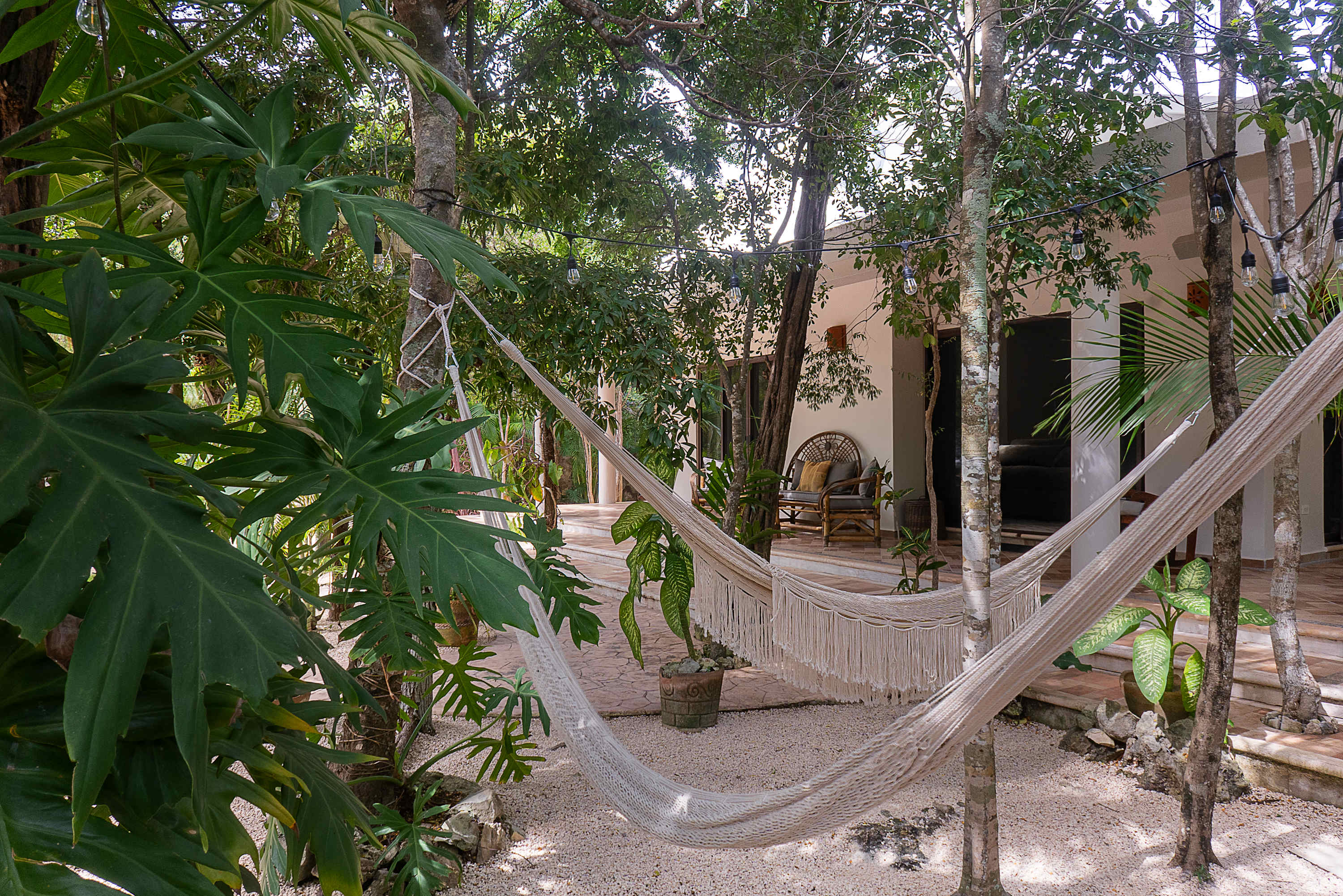 Relax in garden hammocks, perfect for slow mornings and peaceful afternoons