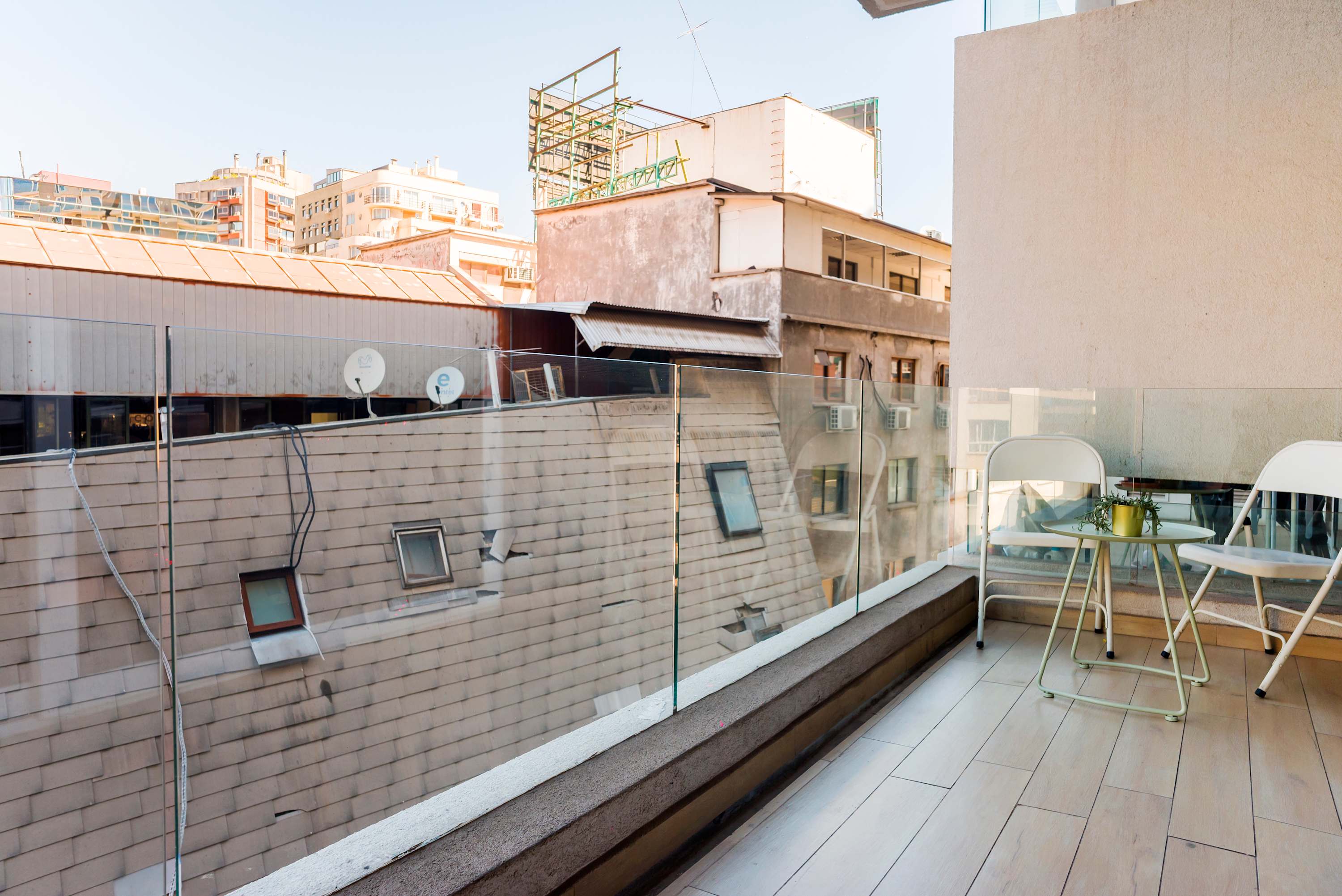 Relax on your private balcony with city views, perfect for morning coffee or evening drinks.