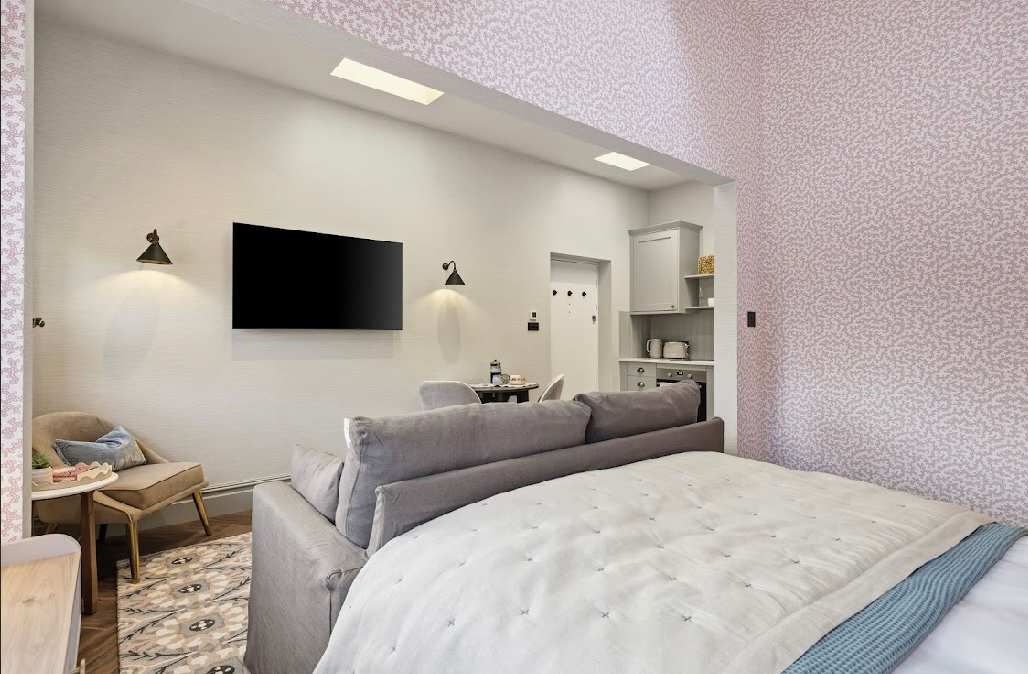 Open-plan space with luxury super king.