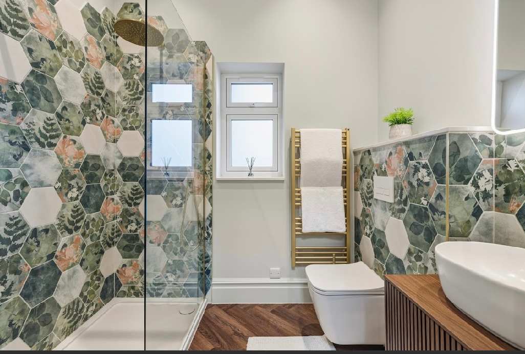 Stylish walk-in shower with boutique finish.