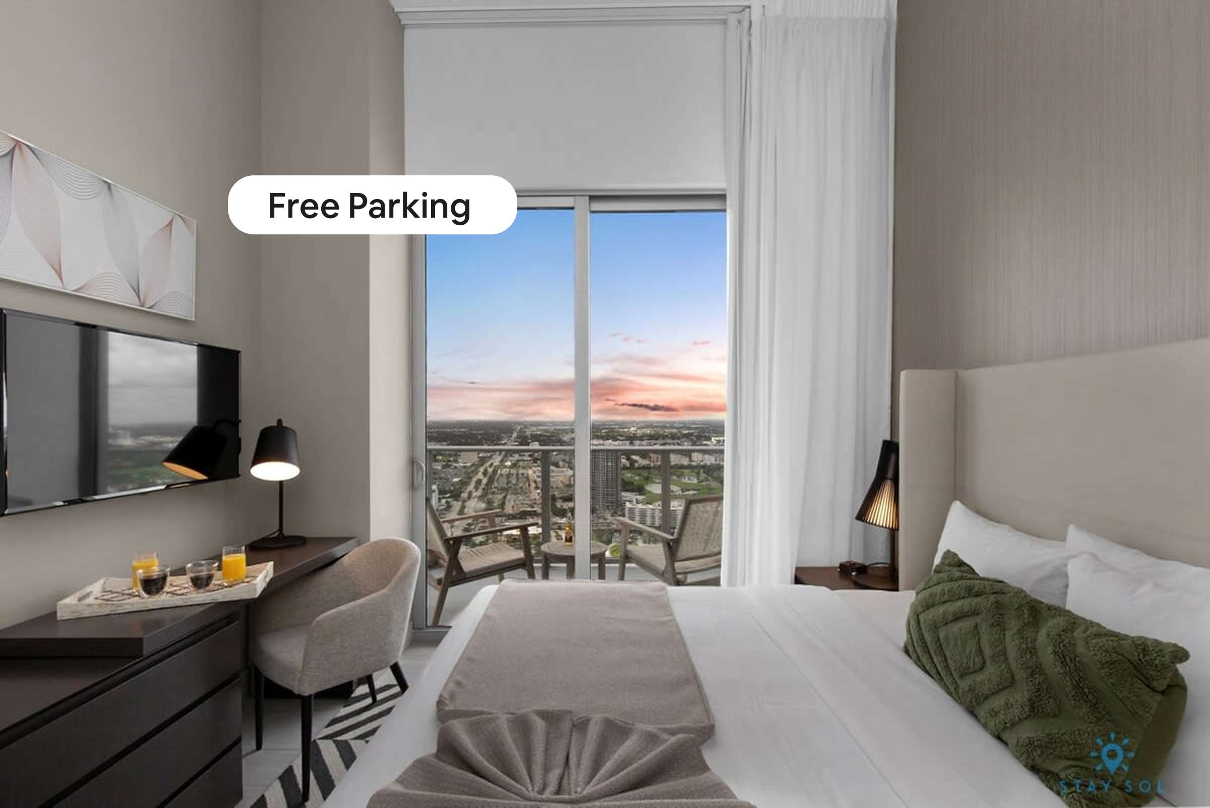 Spectacular Condo w/ Pools + Parking