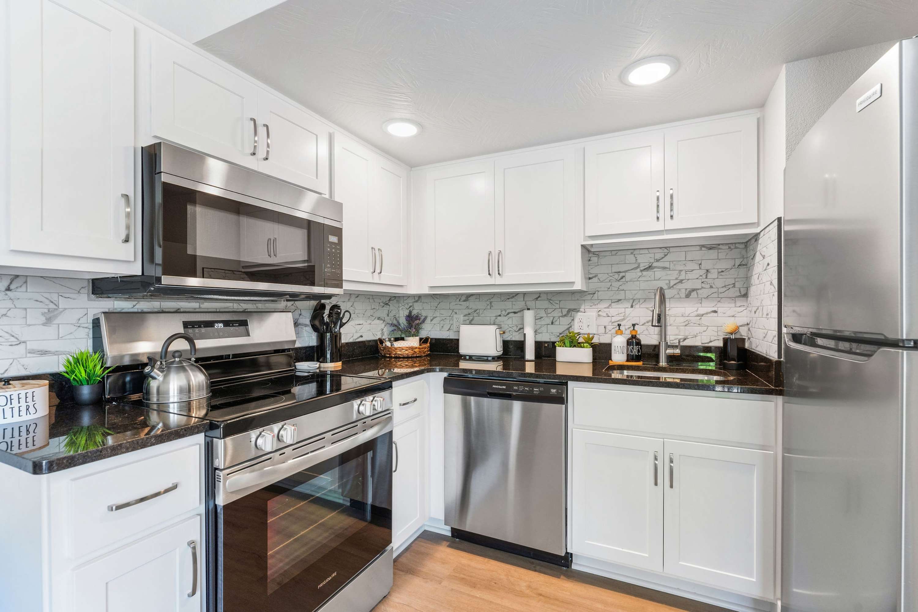 The open kitchen offers ample space & all the comforts of home​