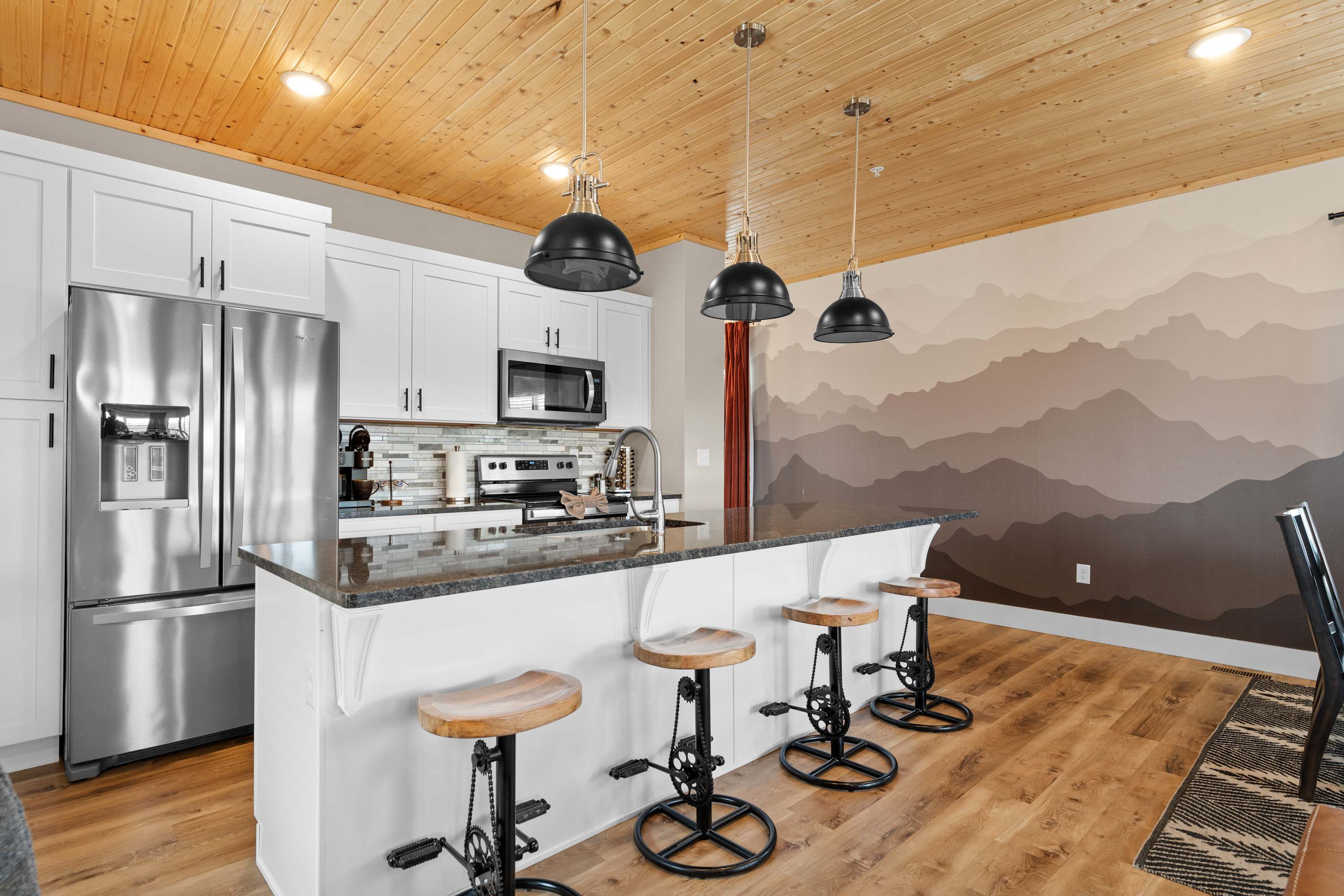 The open kitchen offers ample space & all the comforts of home​