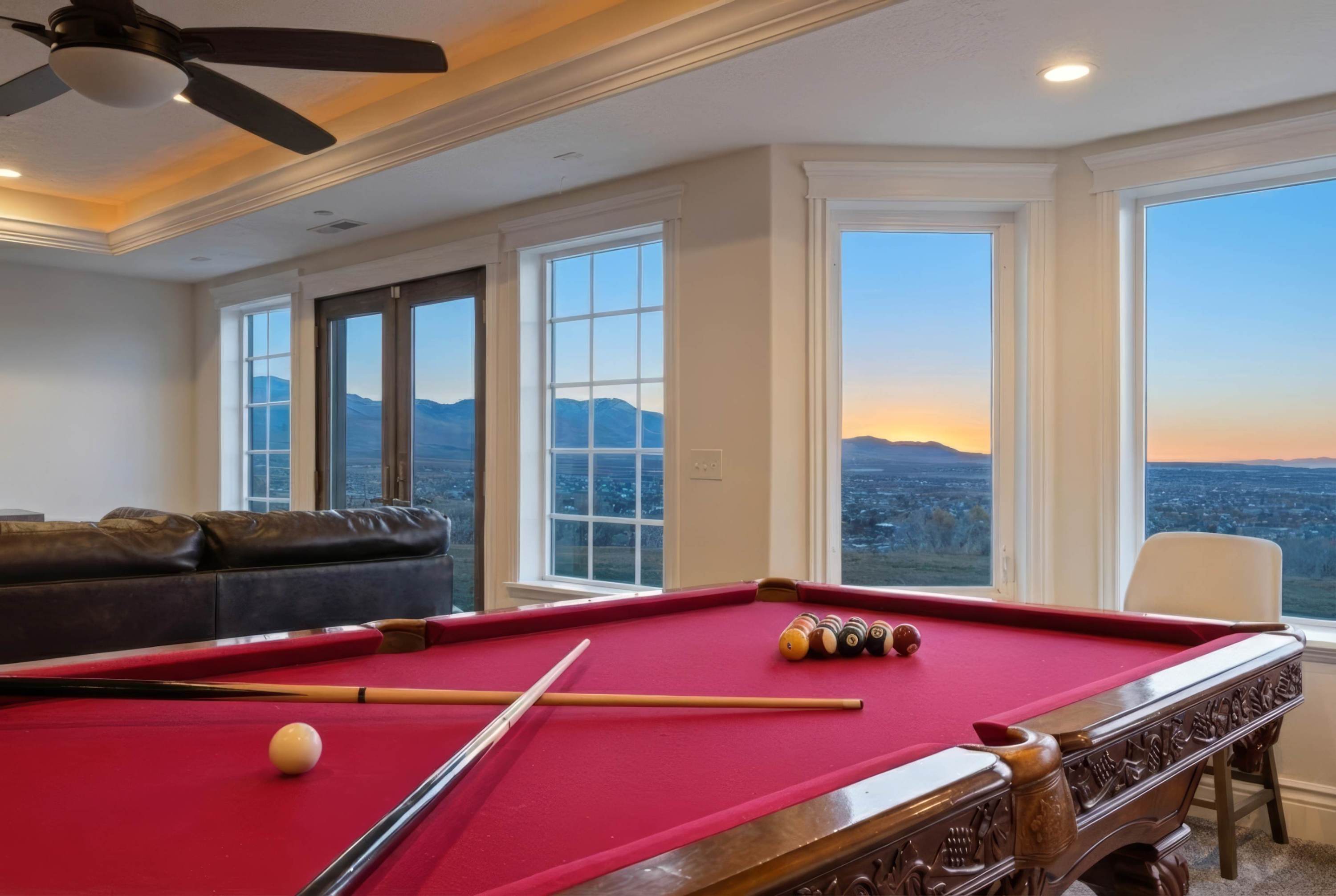 Game room featuring a full-size pool table and scenic views